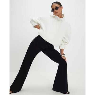 Petite Black High Rise Relaxed Flare Jeans