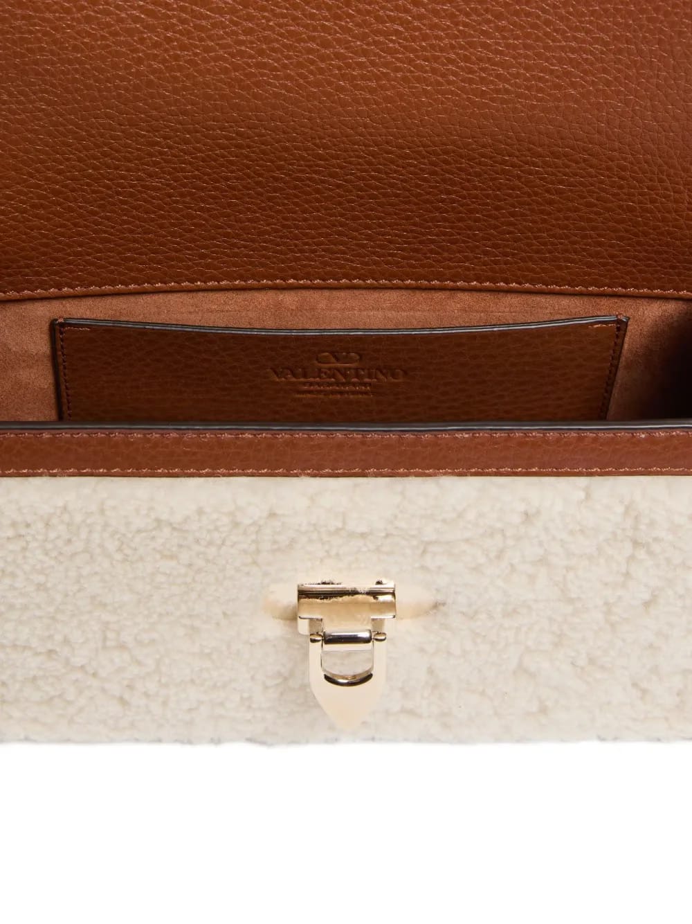 small Rockstud shearling shoulder bag