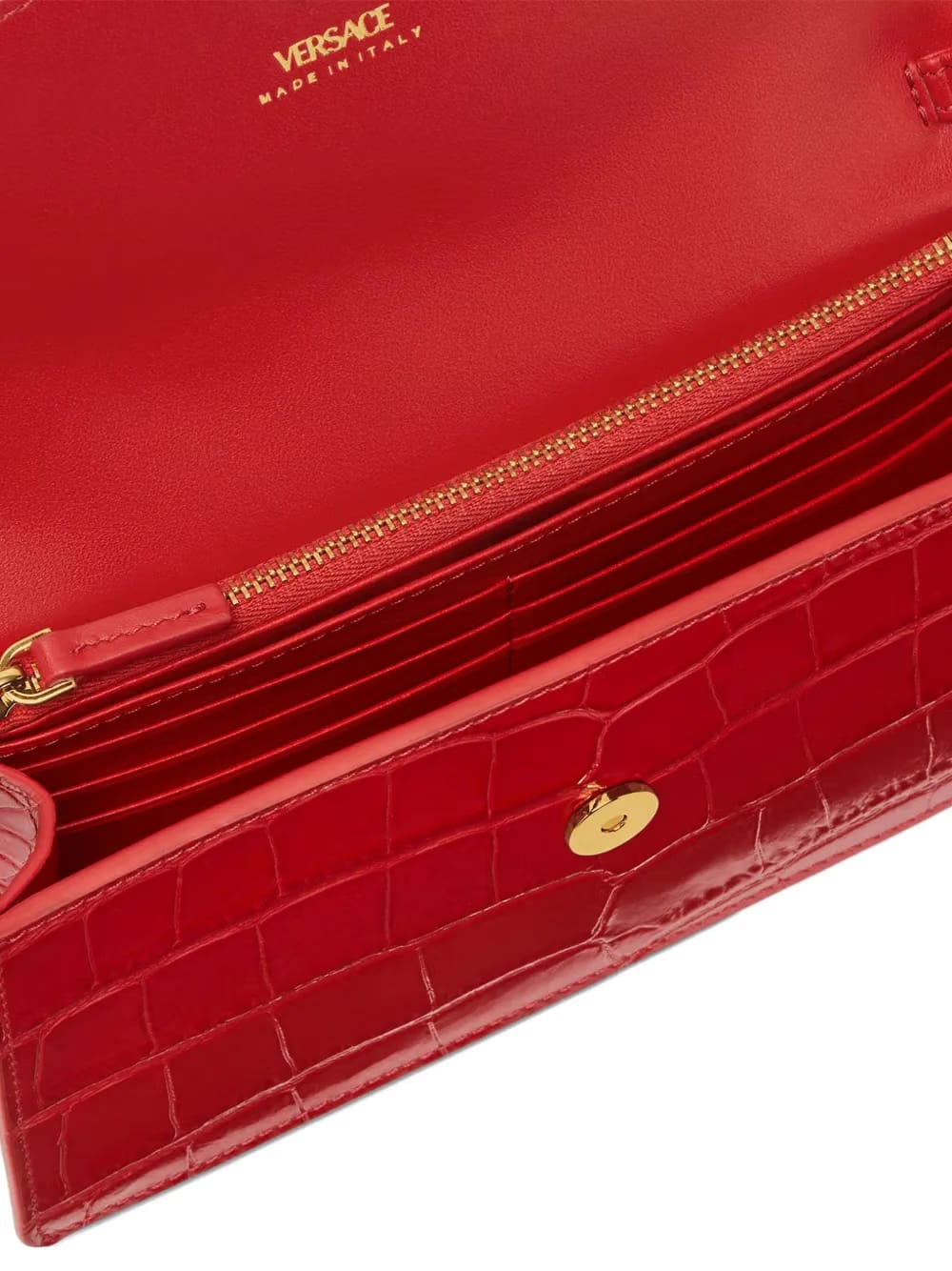 Medusa Head leather clutch bag