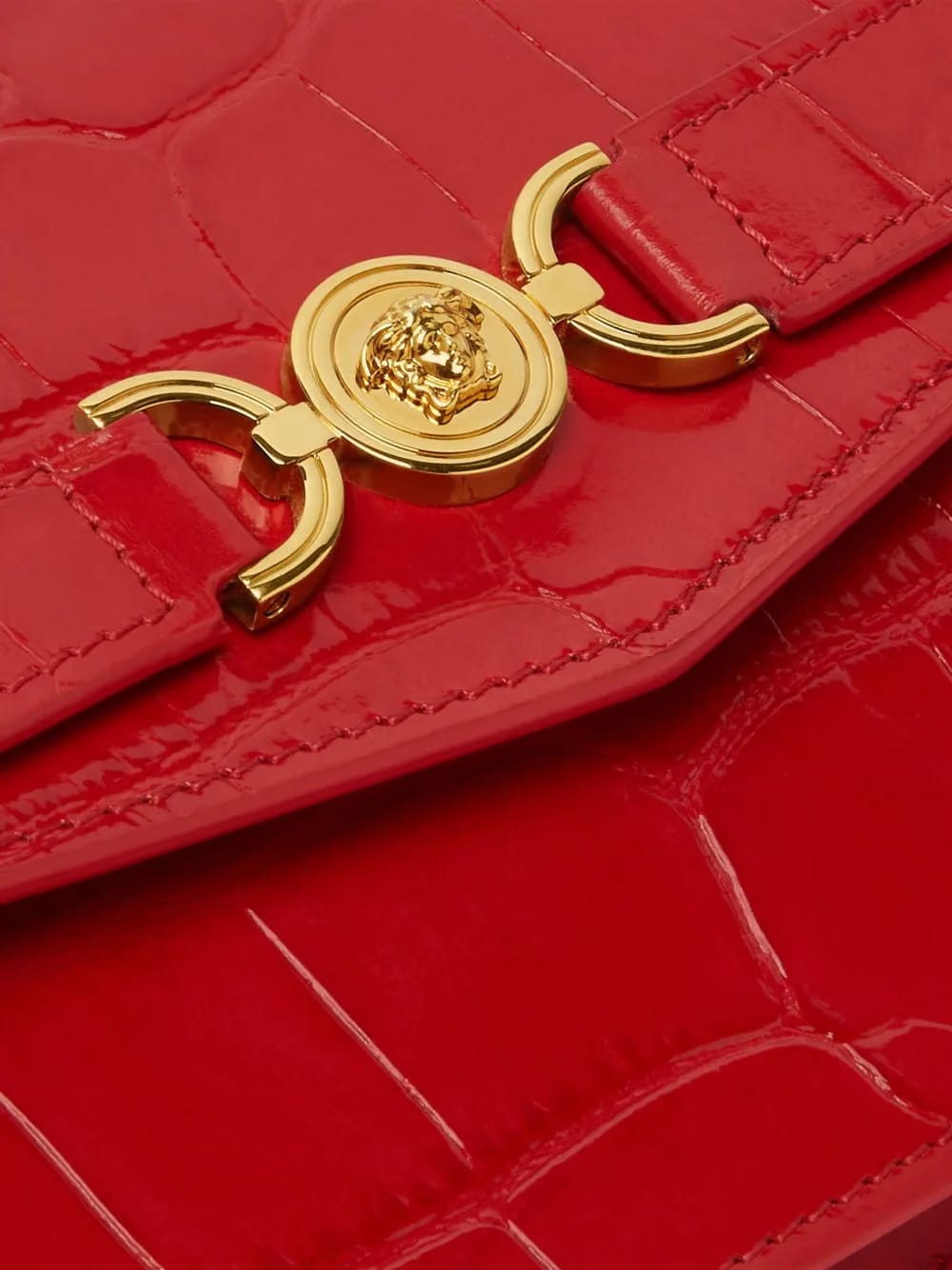 Medusa Head leather clutch bag
