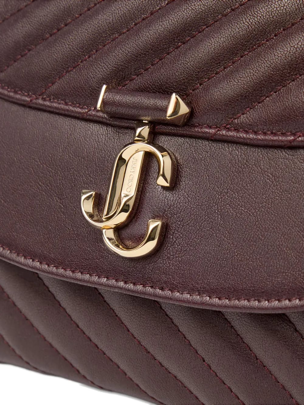 Curve quilted shoulder bag
