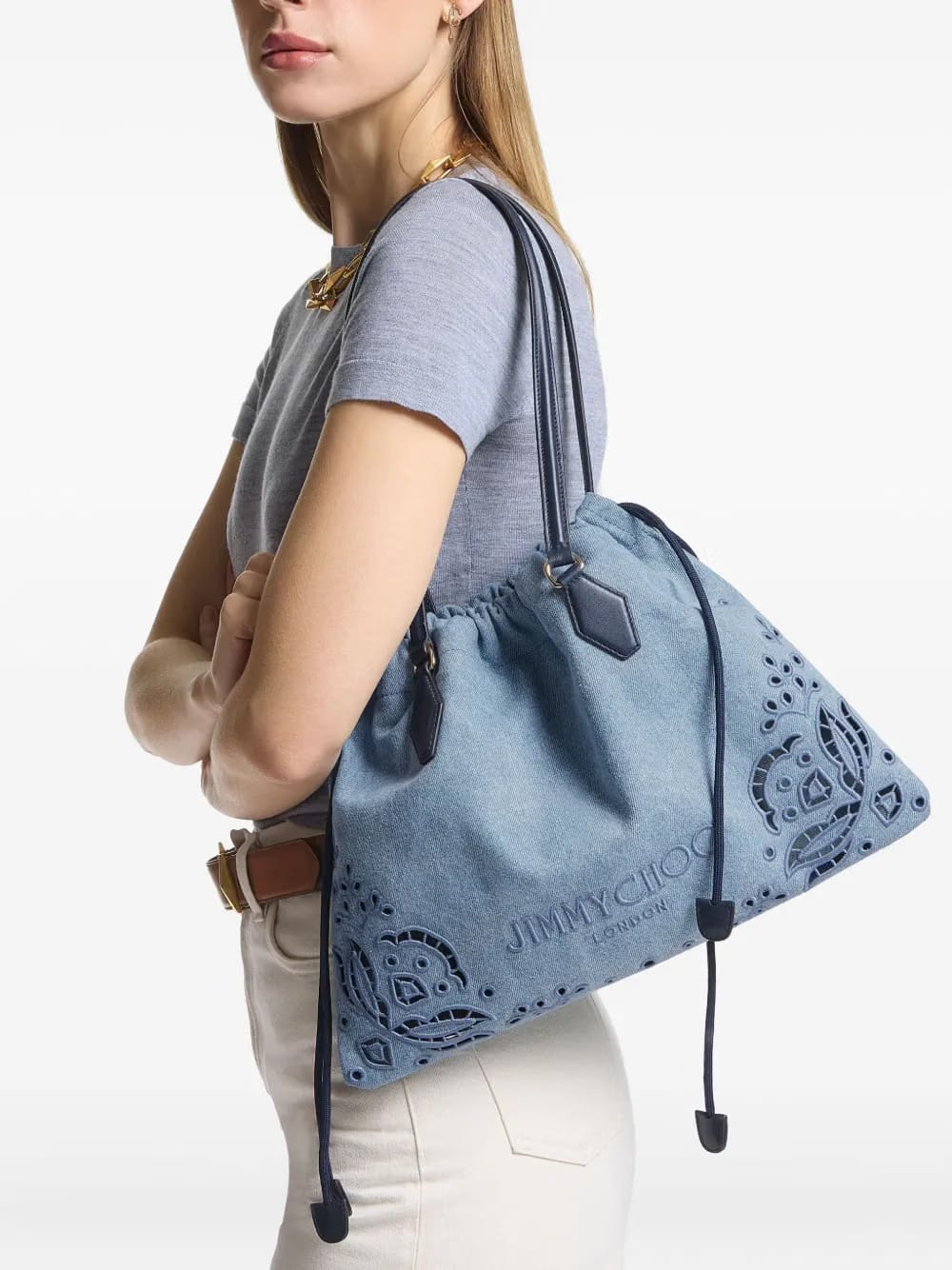 laser-cut drawstring shoulder bag