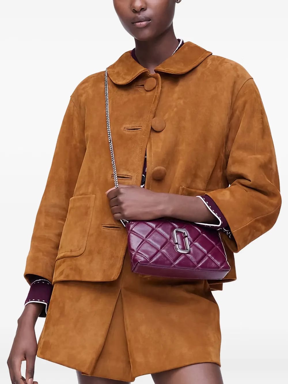 The Quilted top-handle mini bag