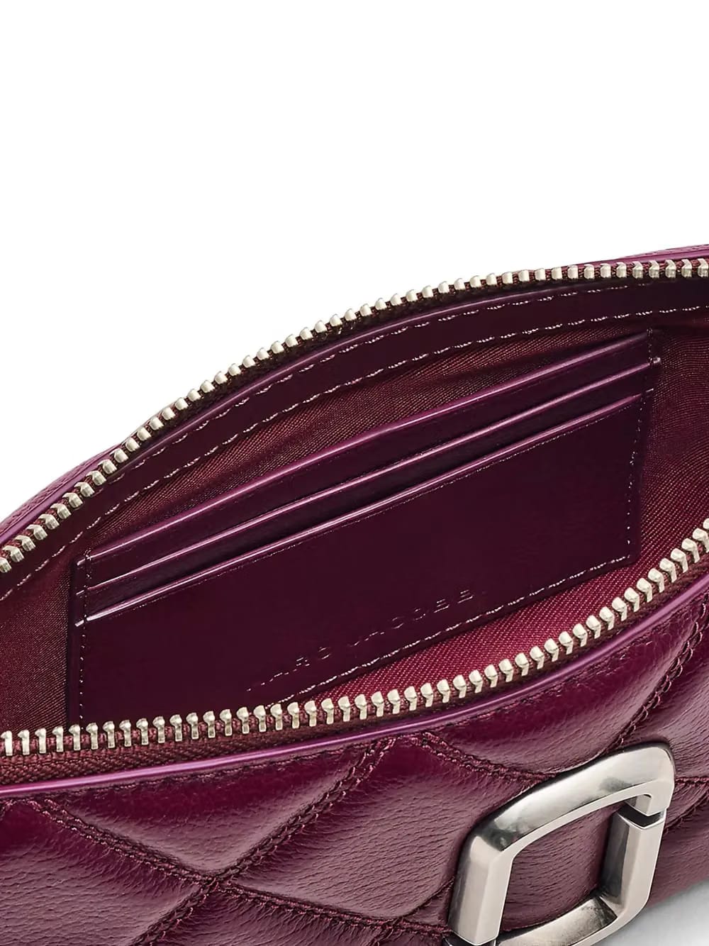 The Quilted top-handle mini bag