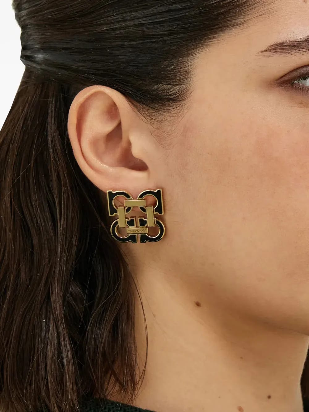 Four Gancini earrings