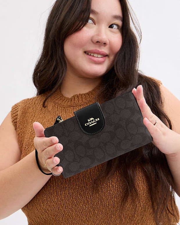 Coach Phone Wallet In Signature Canvas Signature Canvas-Gold-Walnut-Black