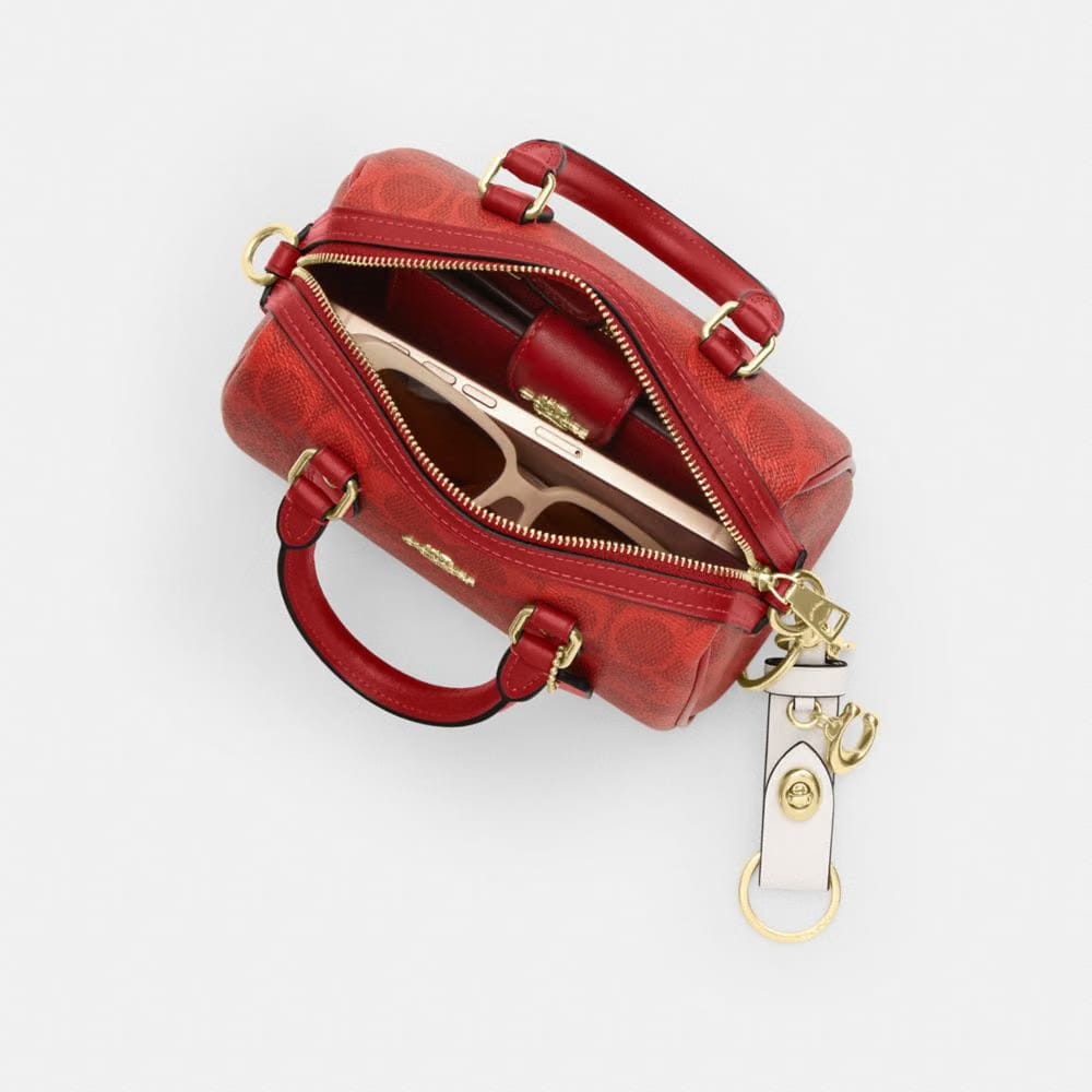 Coach Mini Rowan Crossbody Bag In Signature Canvas Gold Crimson