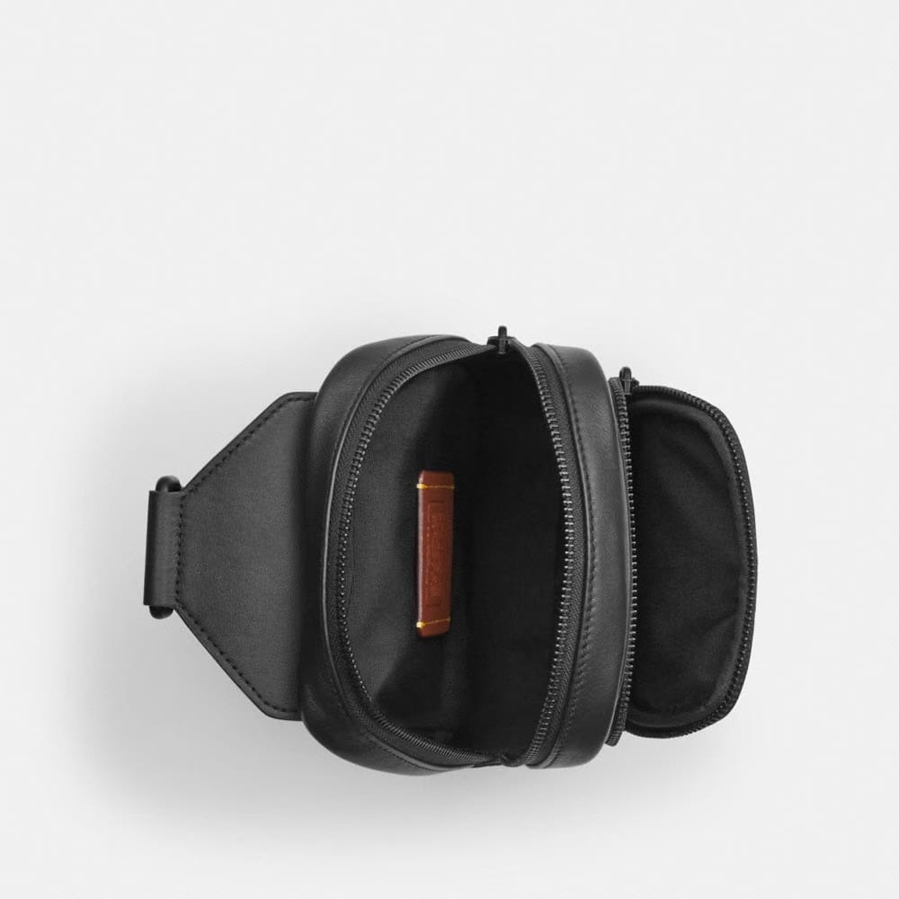 Coach Racer Sling Pack In Signature Canvas Matte Black Black Signature