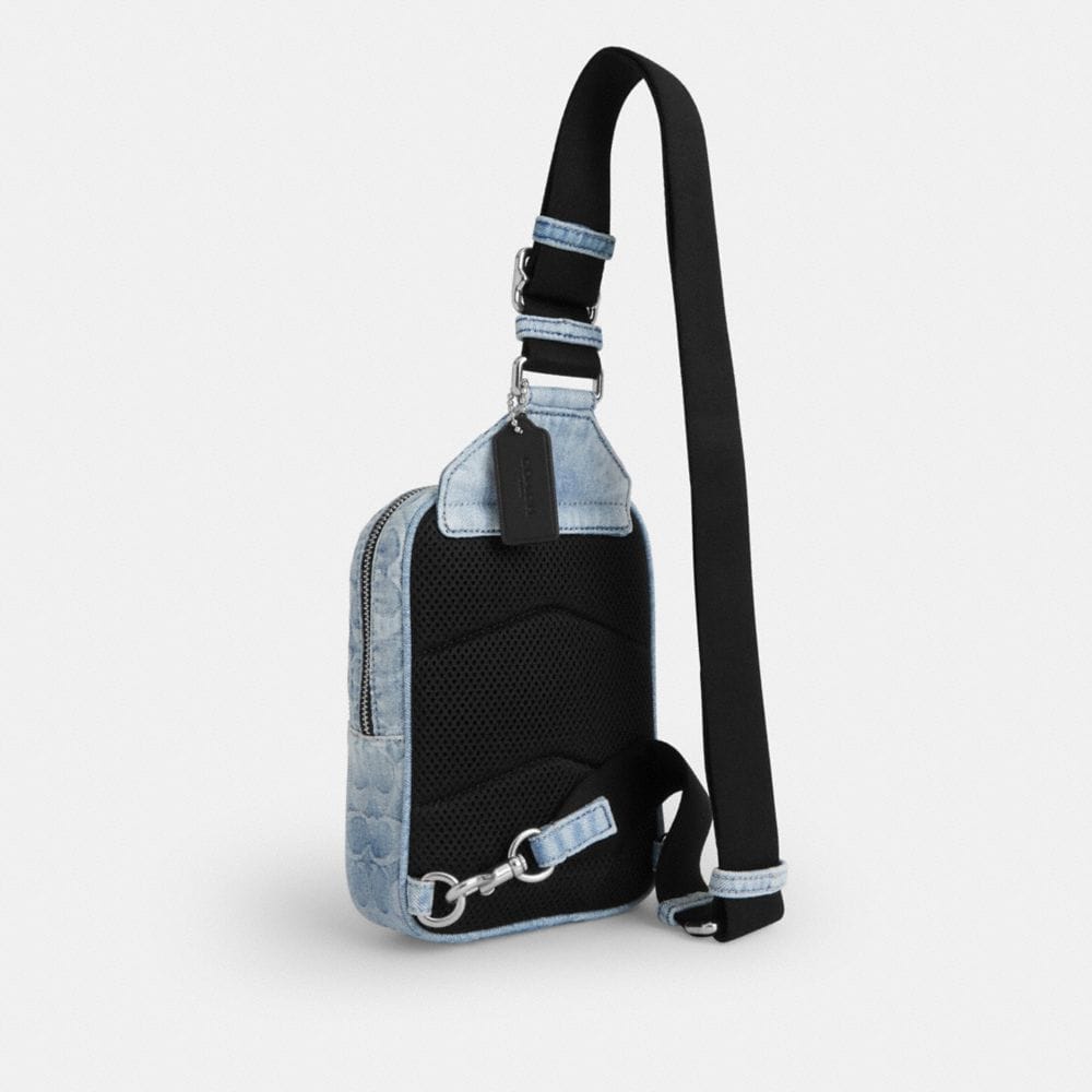 Coach Racer Sling Pack In Loved Signature Denim Silver Light Indigo