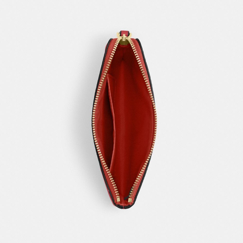 Corner Zip Wristlet In Signature Canvas