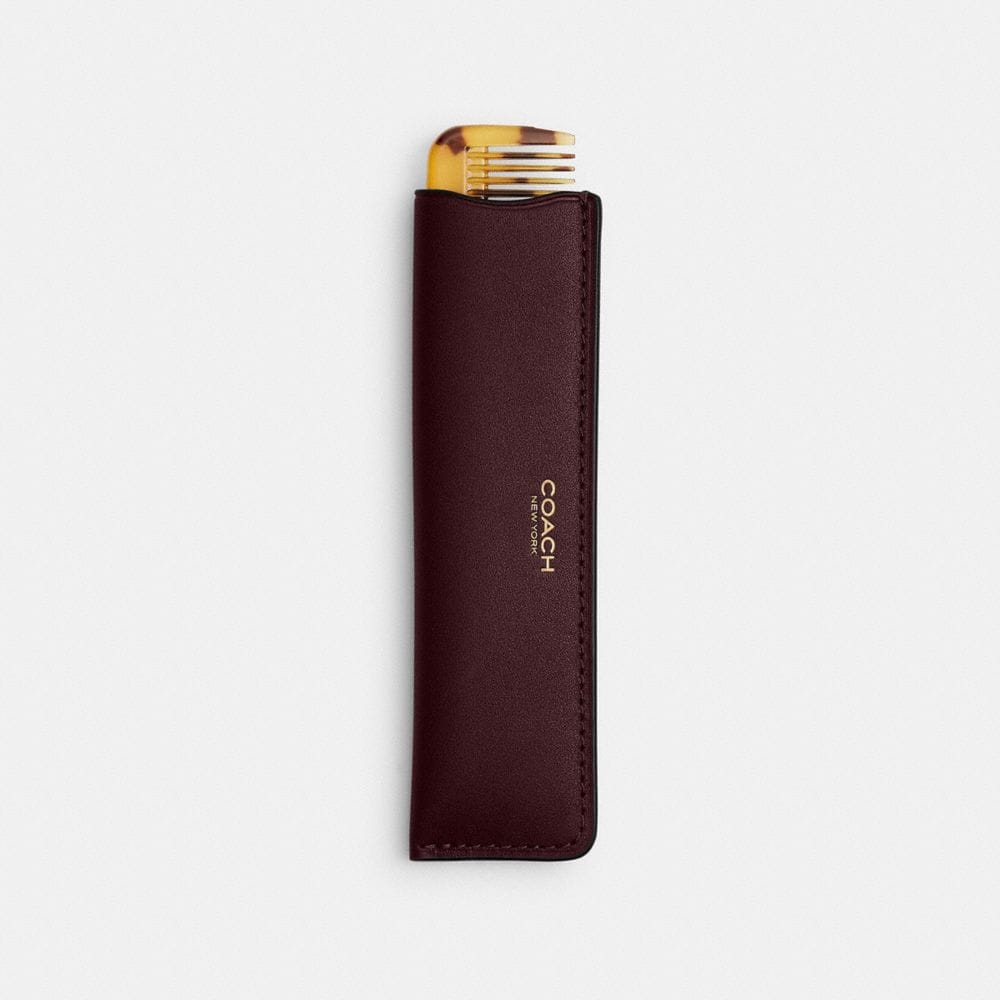 Coach Comb With Sleeve Brass Merlot