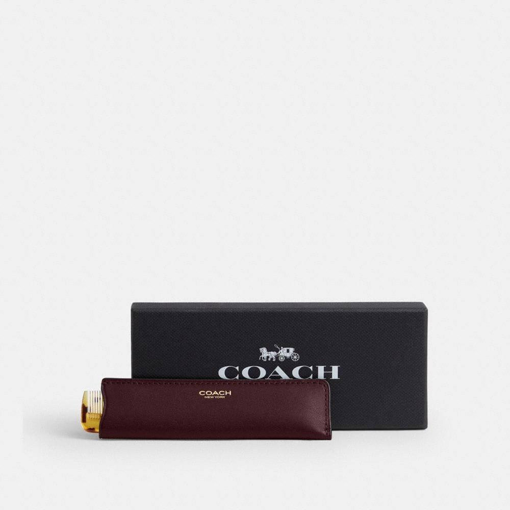 Coach Comb With Sleeve Brass Merlot