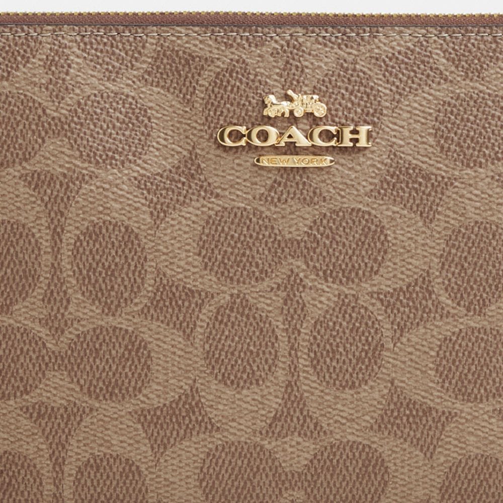 Large Corner Zip Wristlet In Signature Canvas