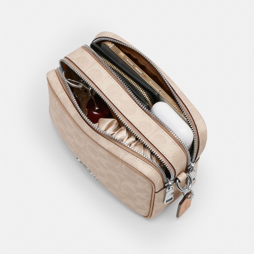 Mini Carey Crossbody Bag In Signature Canvas