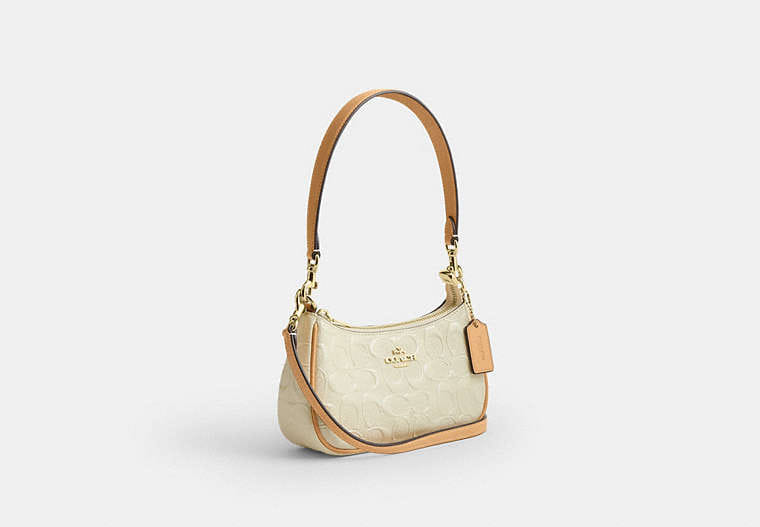 Teri Mini Crossbody Bag In Signature Leather