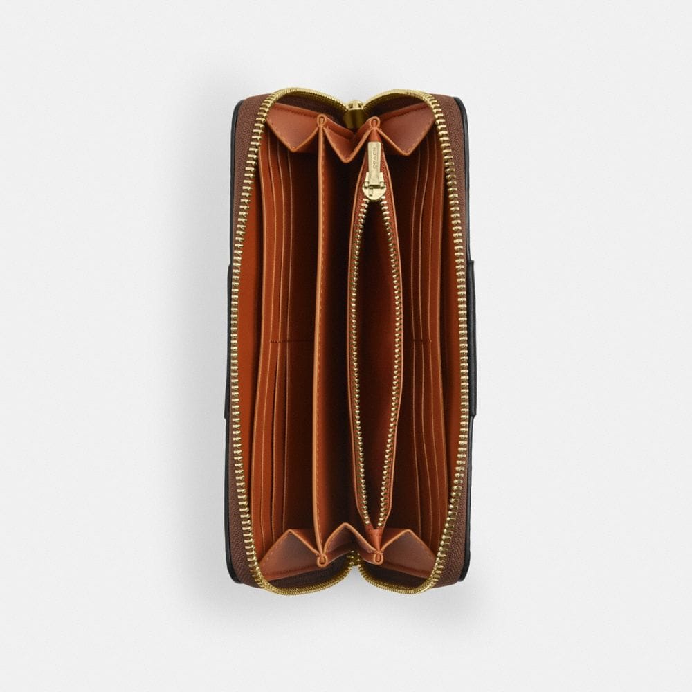Long Zip Around Wallet In Signature Canvas With Stripe