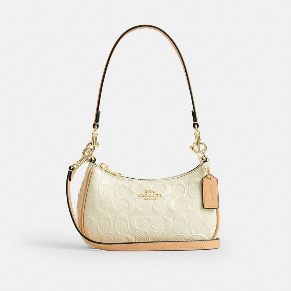 Teri Mini Crossbody Bag In Signature Leather