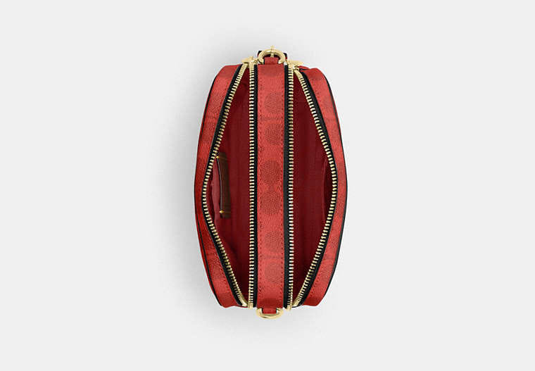 Mini Carey Crossbody Bag In Signature Canvas