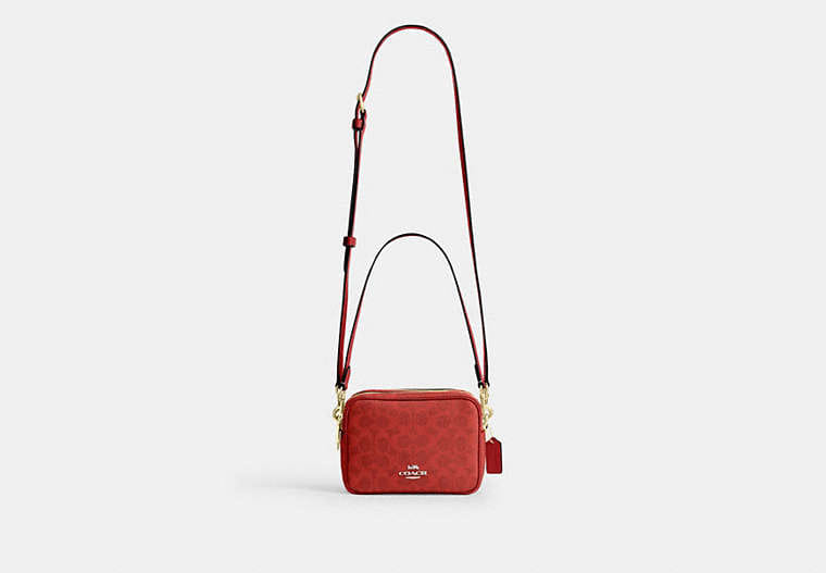 Mini Carey Crossbody Bag In Signature Canvas