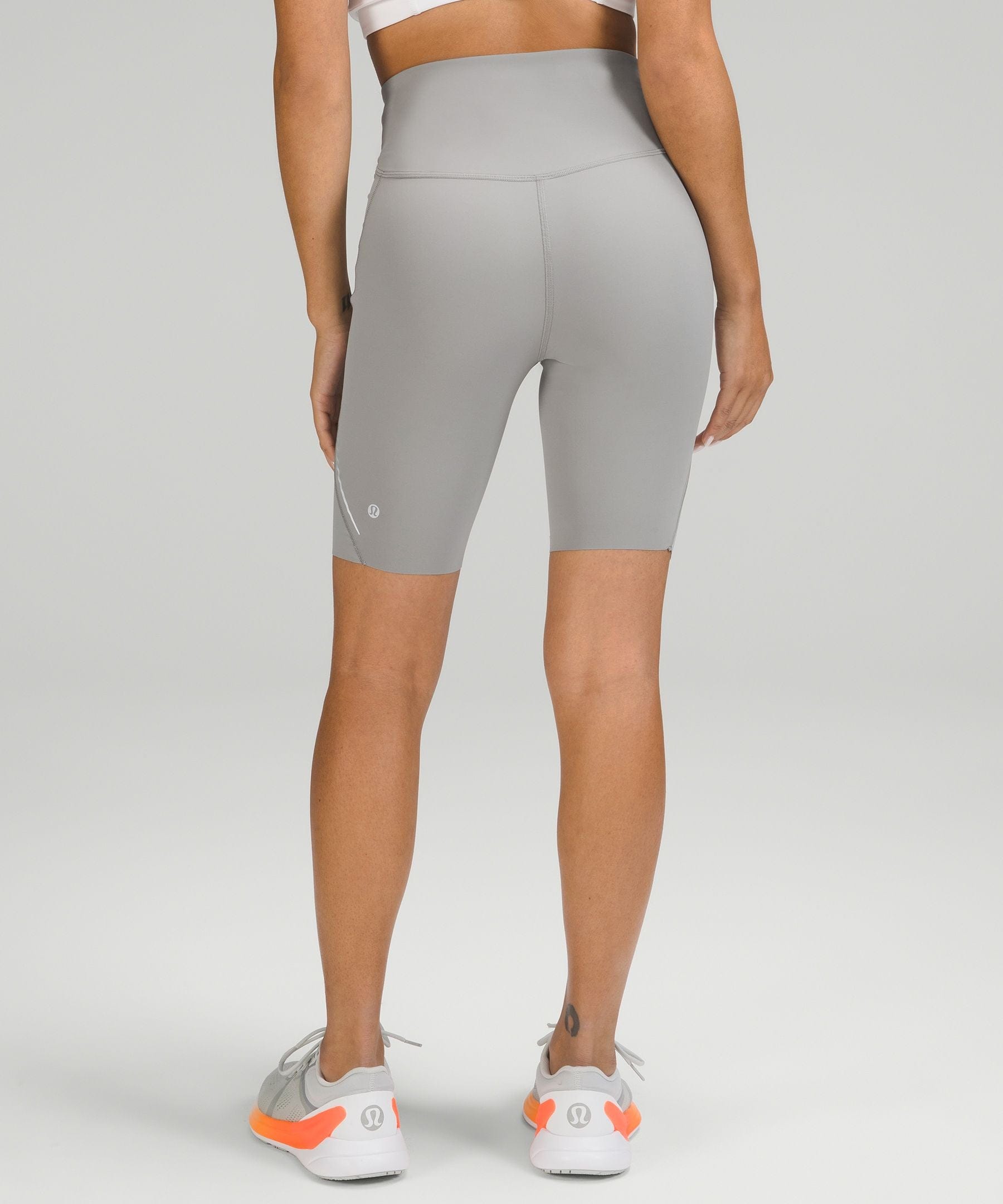Base Pace High-Rise Reflective Short 8"