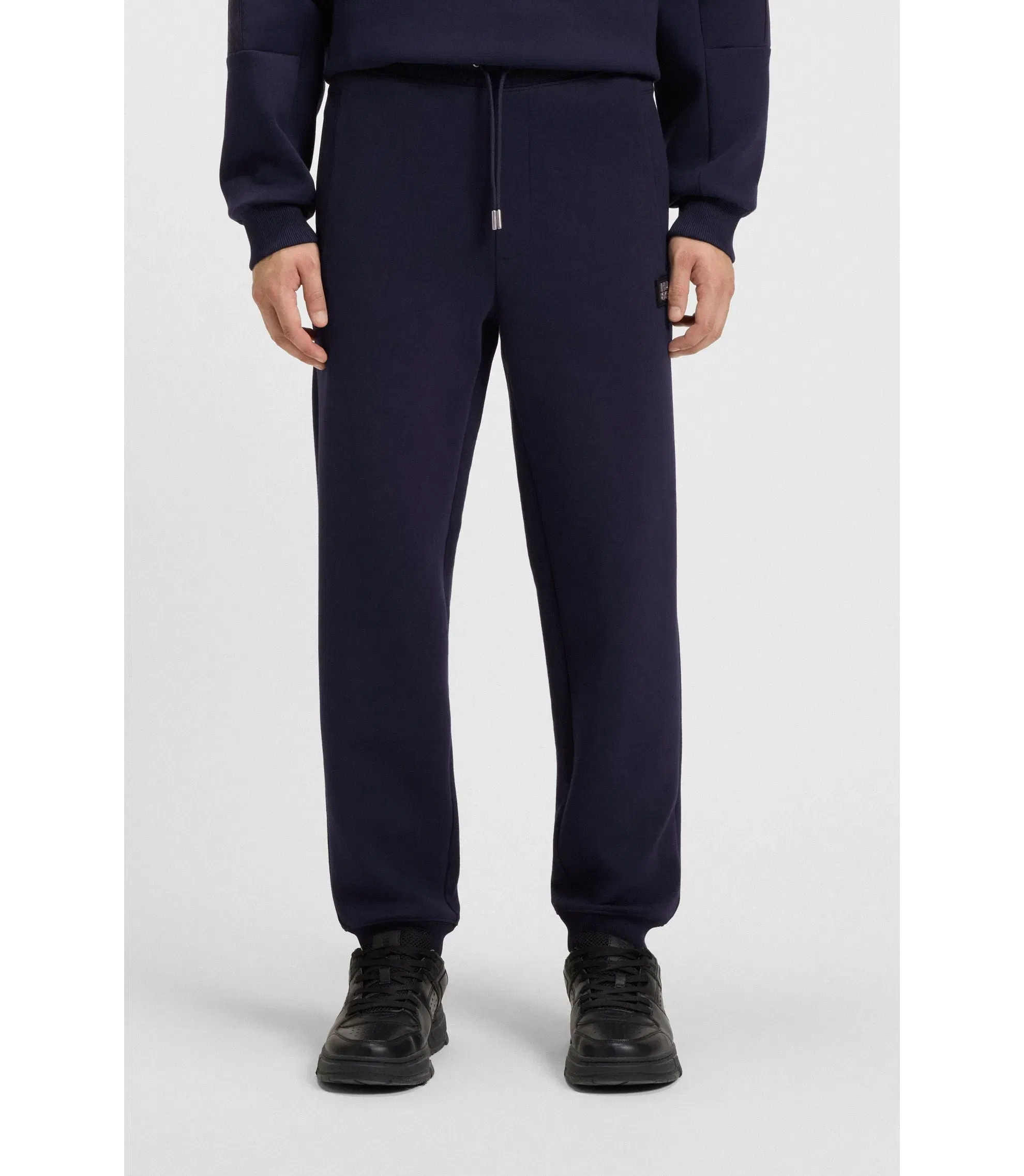 Hugo Stacked Logo Tracksuit Bottoms In A Cotton Blend Dark Blue