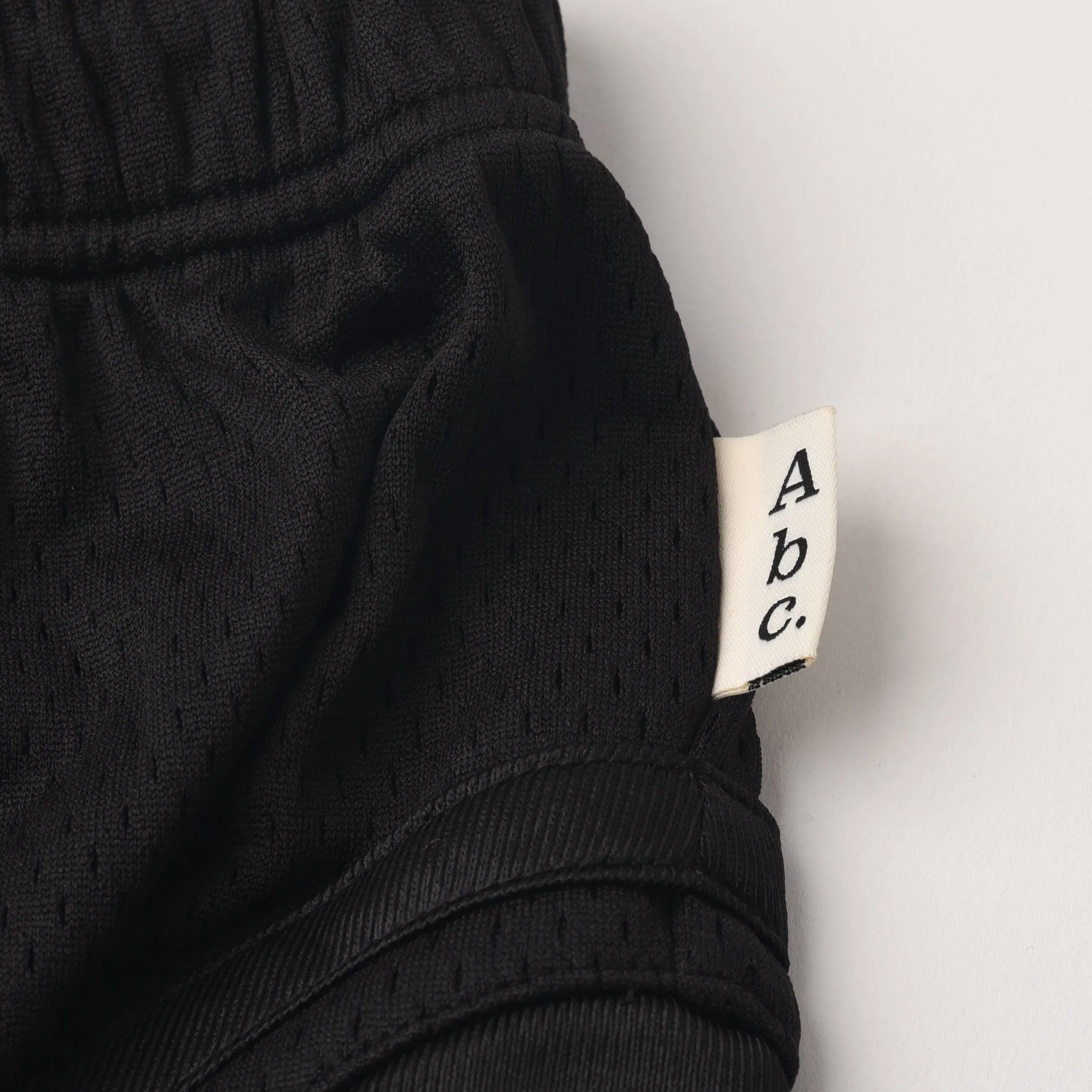 Advisory Board Crystals ABC.123. MESH SATIN BASKETBALL SHORTS - BLACK