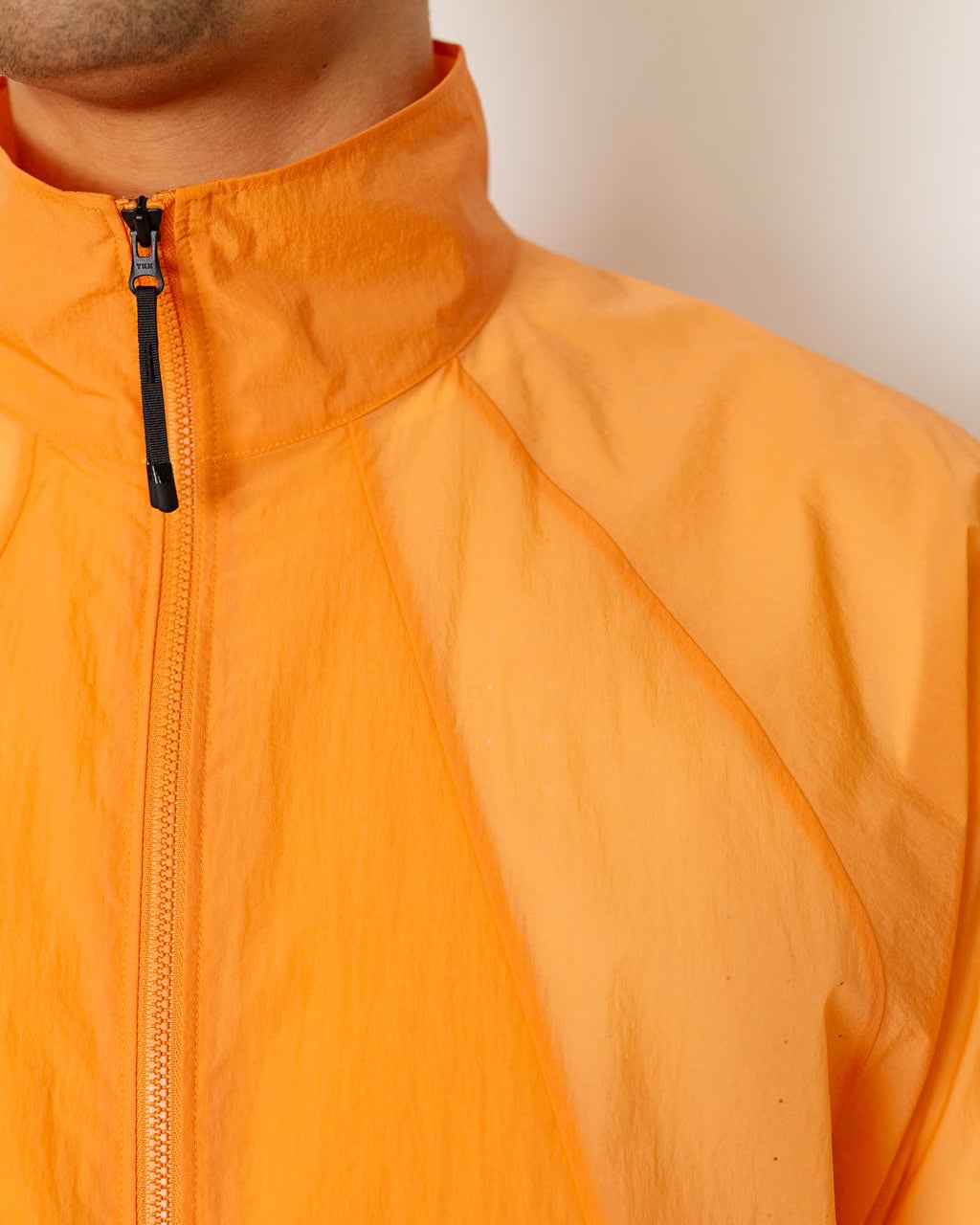 Goldwin Sheer Nylon Wind Jacket - Lily Orange