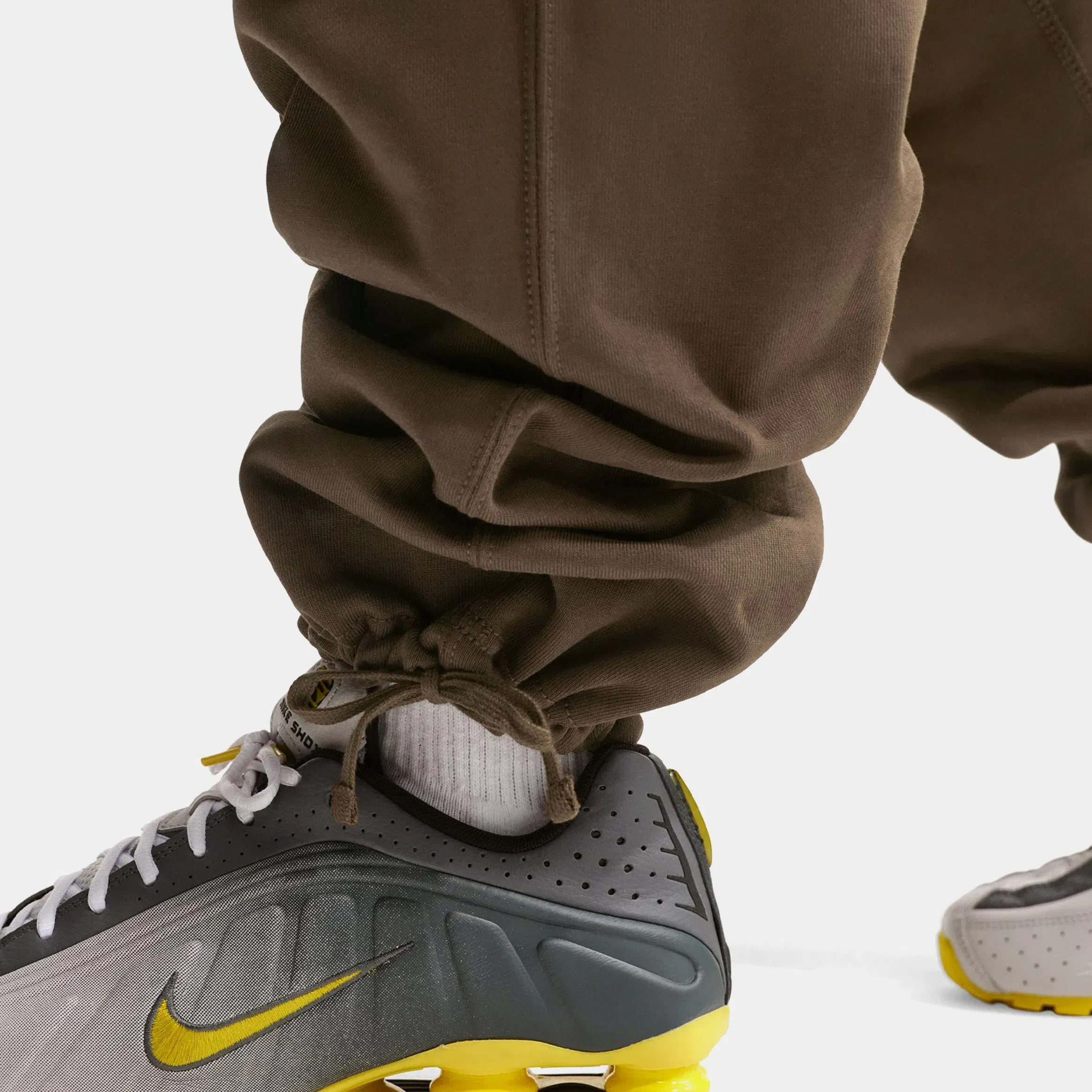 Nike Solo Swoosh Fleece Open Hem Mens Pants (Brown)