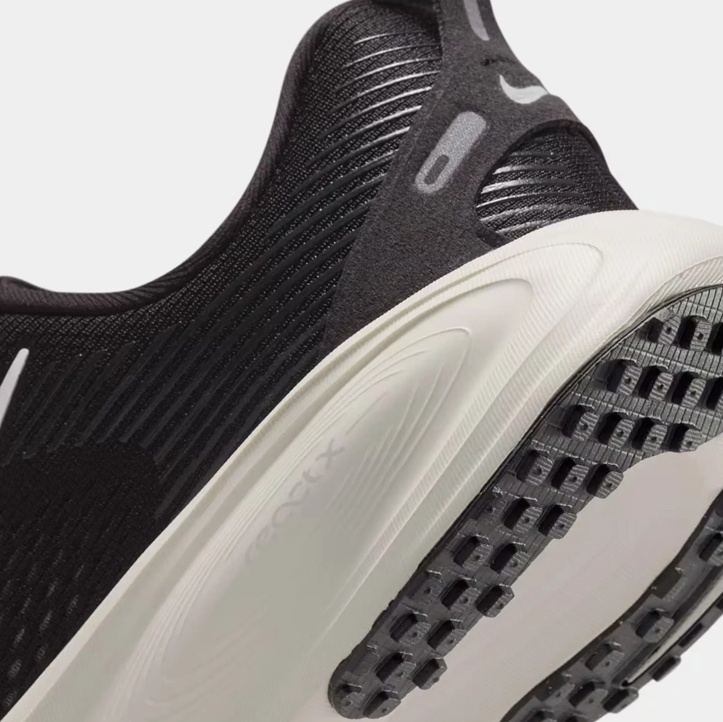 Nike Vomero 18 Grade School Running Shoes (Black/Coconut Milk/Iron Ore/Summit White)