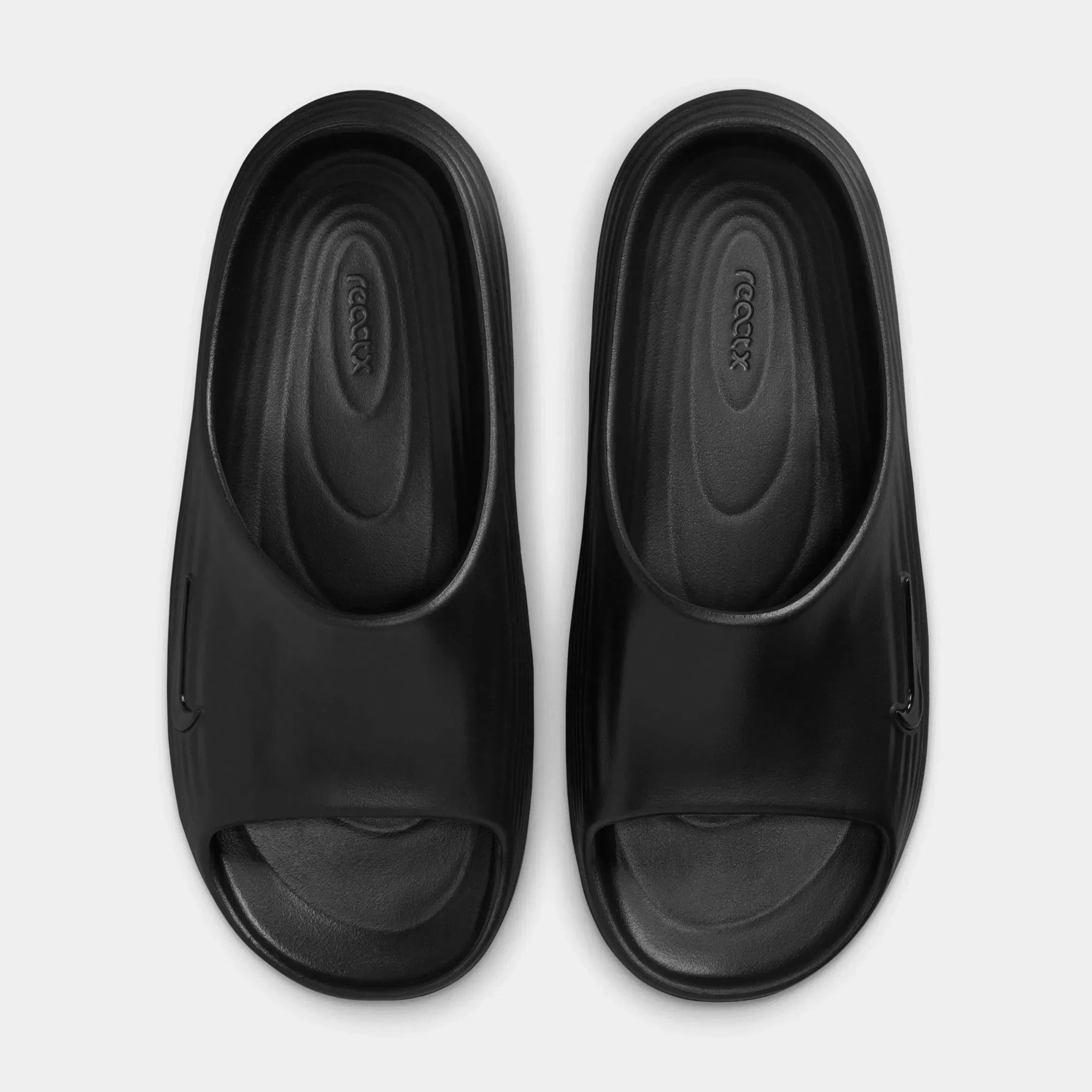 Nike ReactX Rejuven8 Slide Womens Sandals (Black/Black/Black)