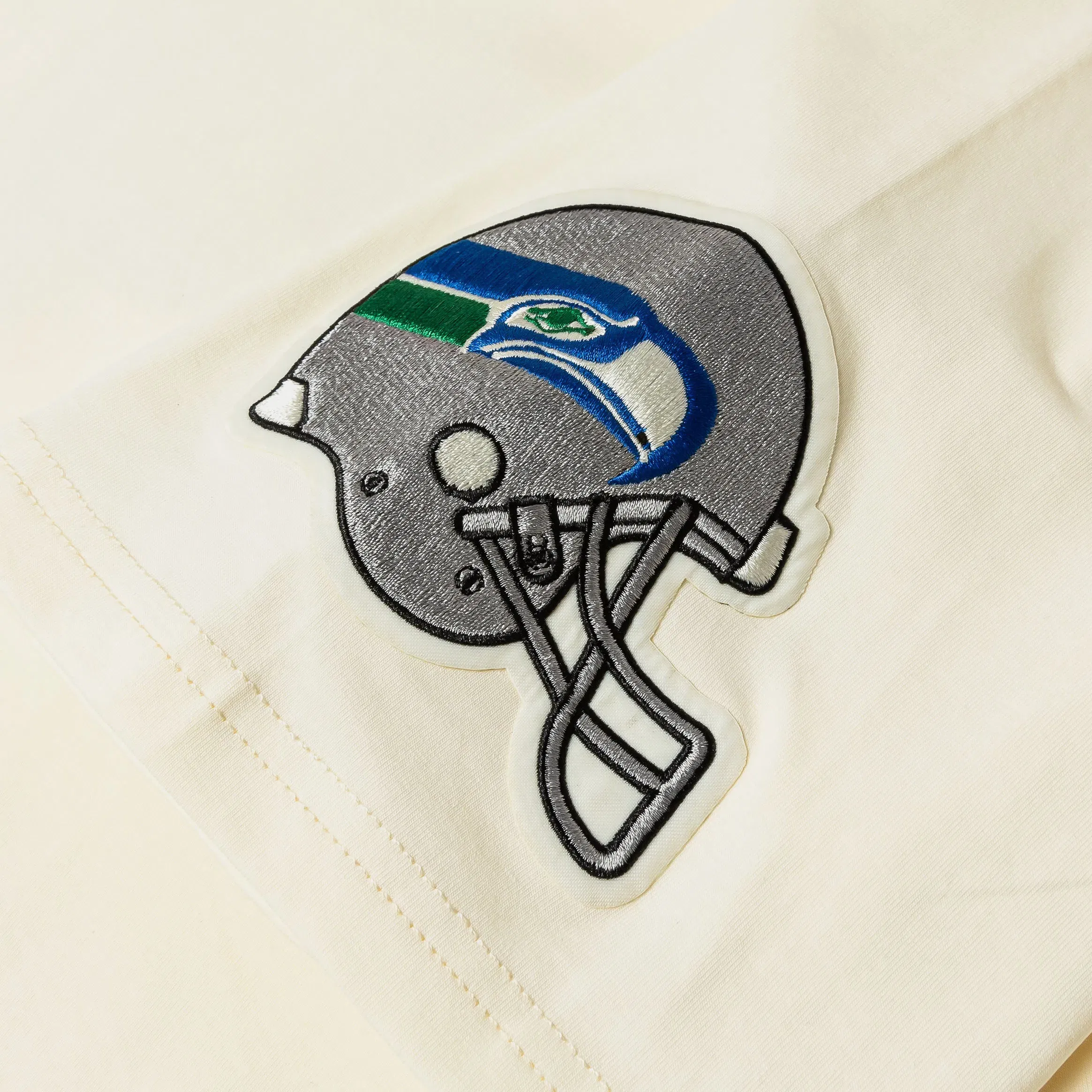 PRO STANDARD Seattle Seahawks Modern Originals Ringer Mens Short Sleeve Shirt (Beige/Blue)