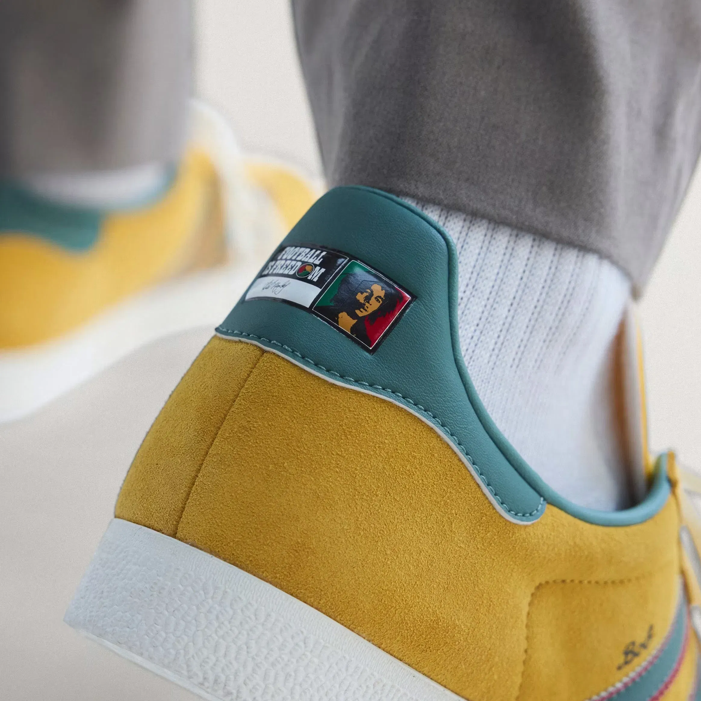 adidas Gazelle Jamaica x Bob Marley Mens Lifestyle Shoes (Bold Gold/None/Pure Ruby)
