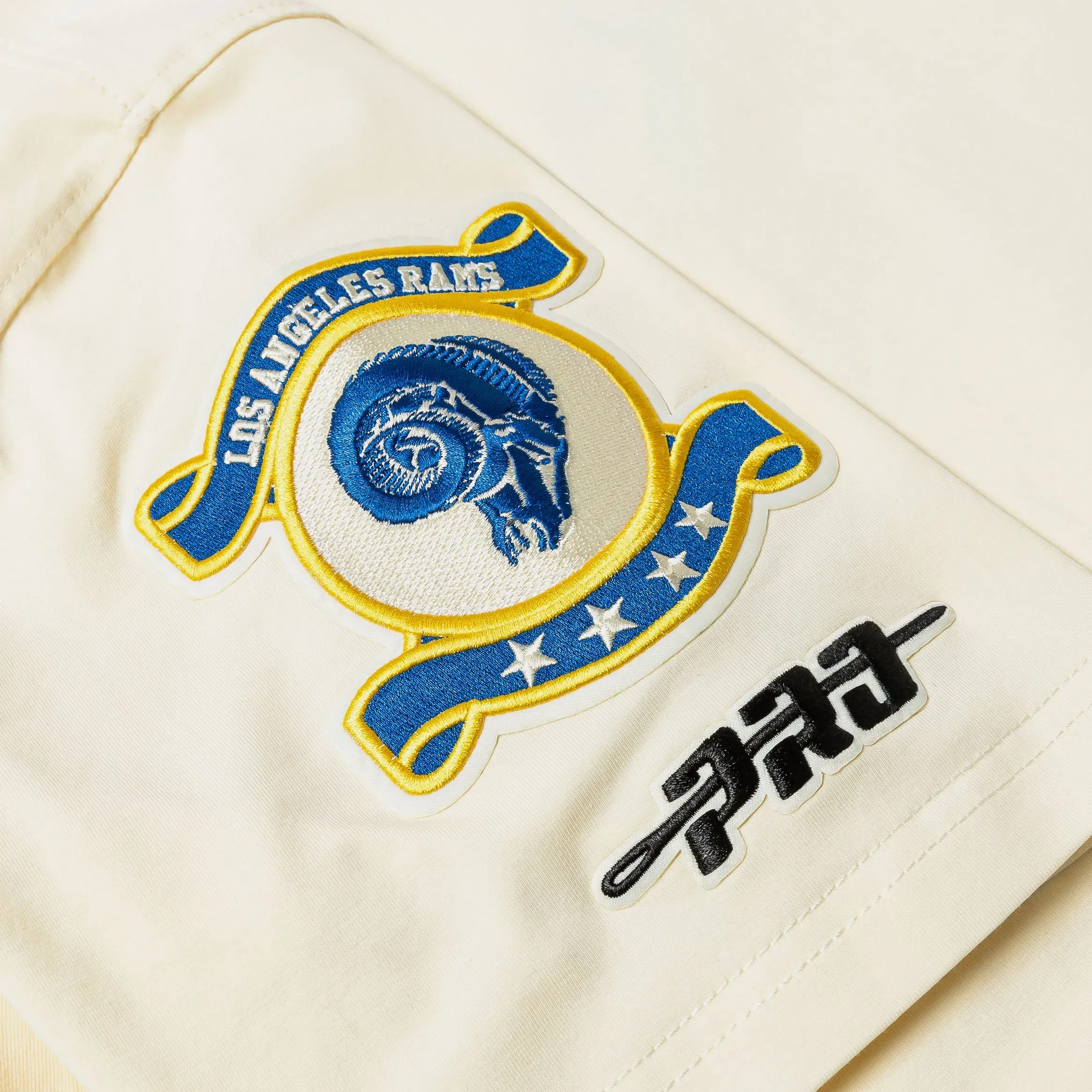 PRO STANDARD Los Angeles Rams Originals Ringer Mens Short Sleeve Shirt (Beige/Blue)