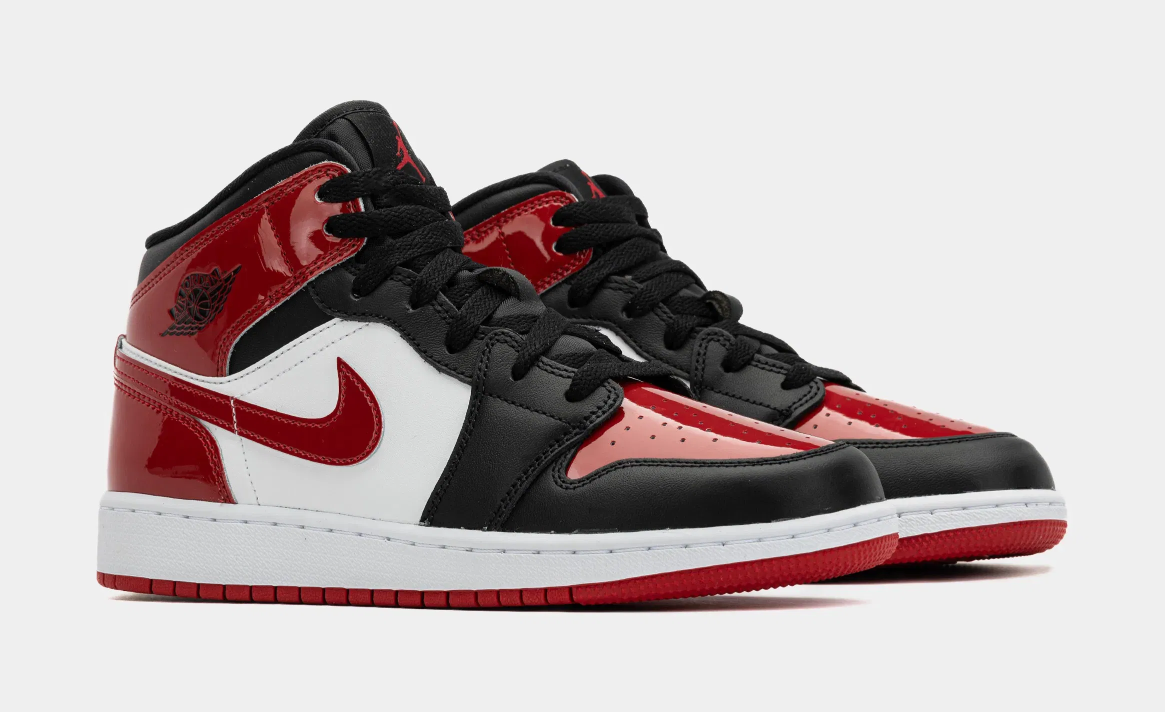 Air Jordan 1 Mid SE Grade School Lifestyle Shoes (Black/Varsity Red/White)