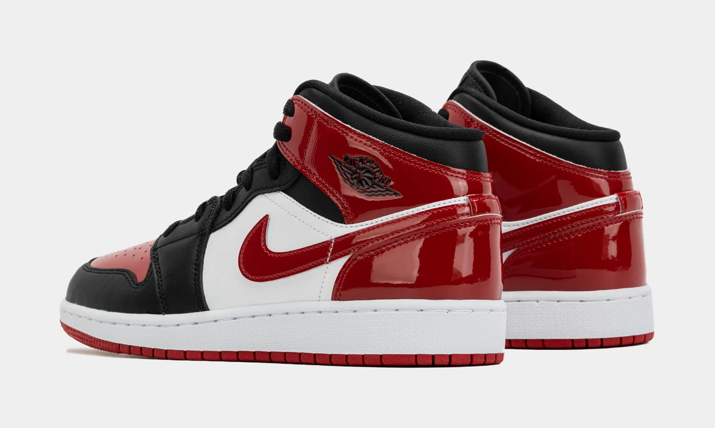 Air Jordan 1 Mid SE Grade School Lifestyle Shoes (Black/Varsity Red/White)