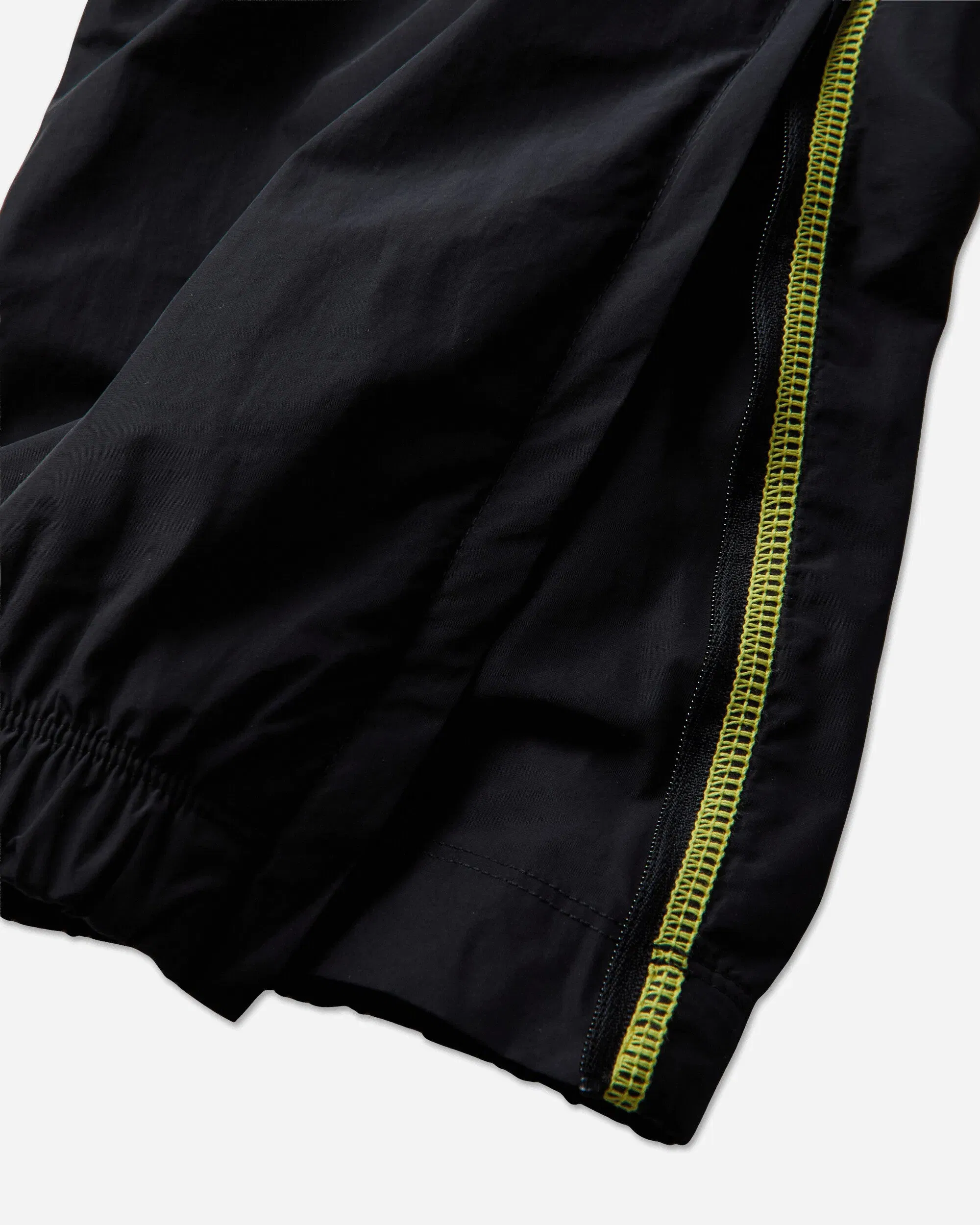 Nike Canada x NOCTA Woven Track Pants Black / Gym Red / Sonic Yellow