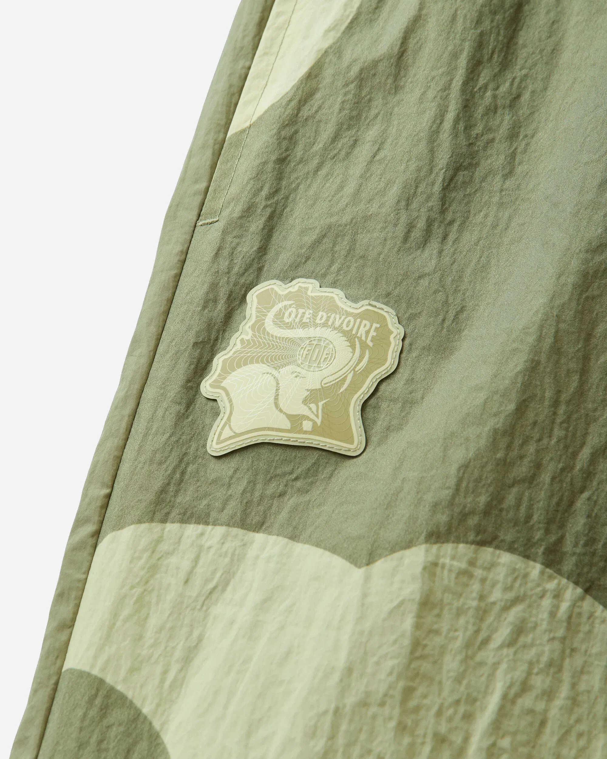 Puma Men's Côte d'Ivoire x Salehe Bembury KING Track Pants Calming Green