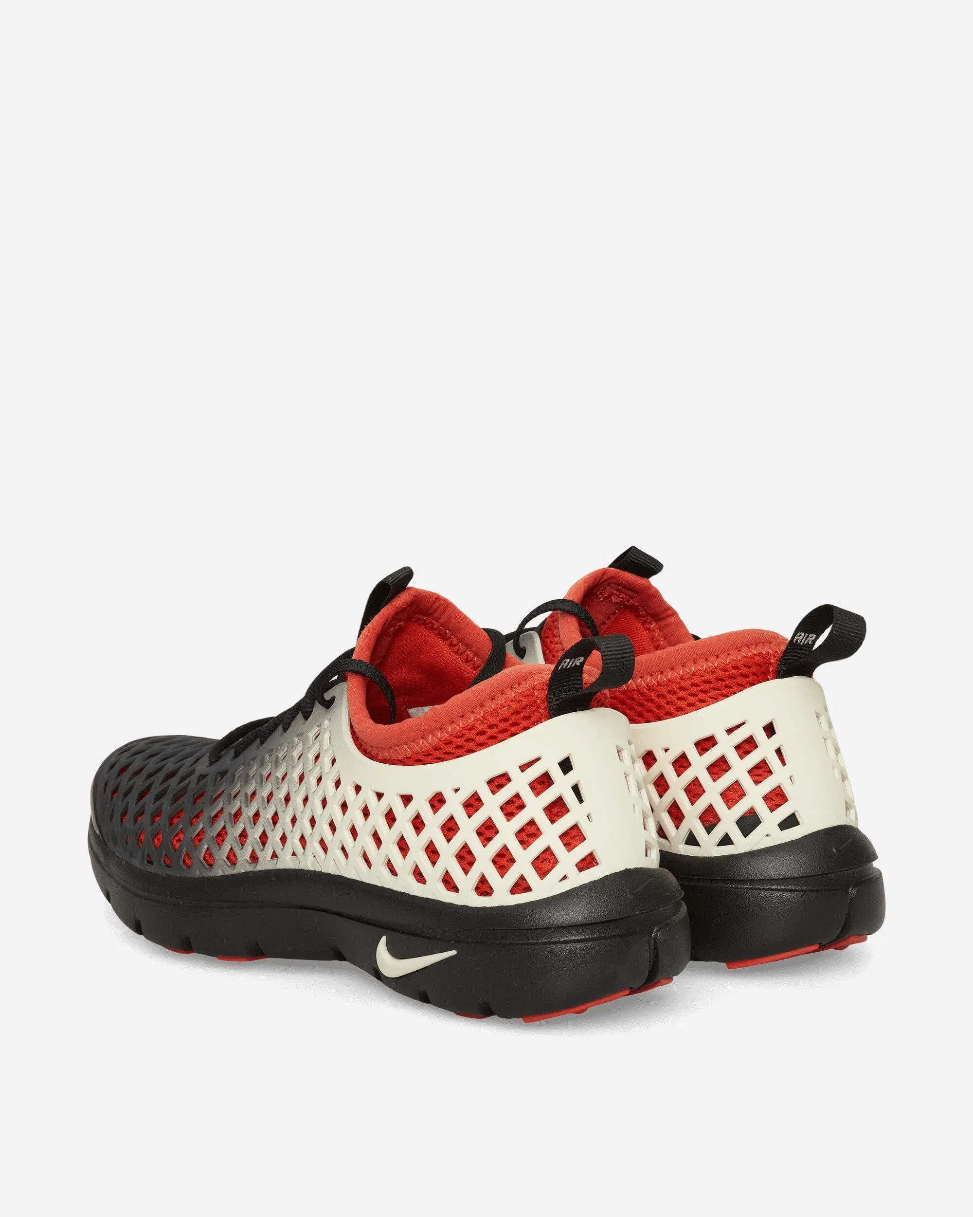 Nike Women's Rejuven8 Sneakers Black / Rust Factor
