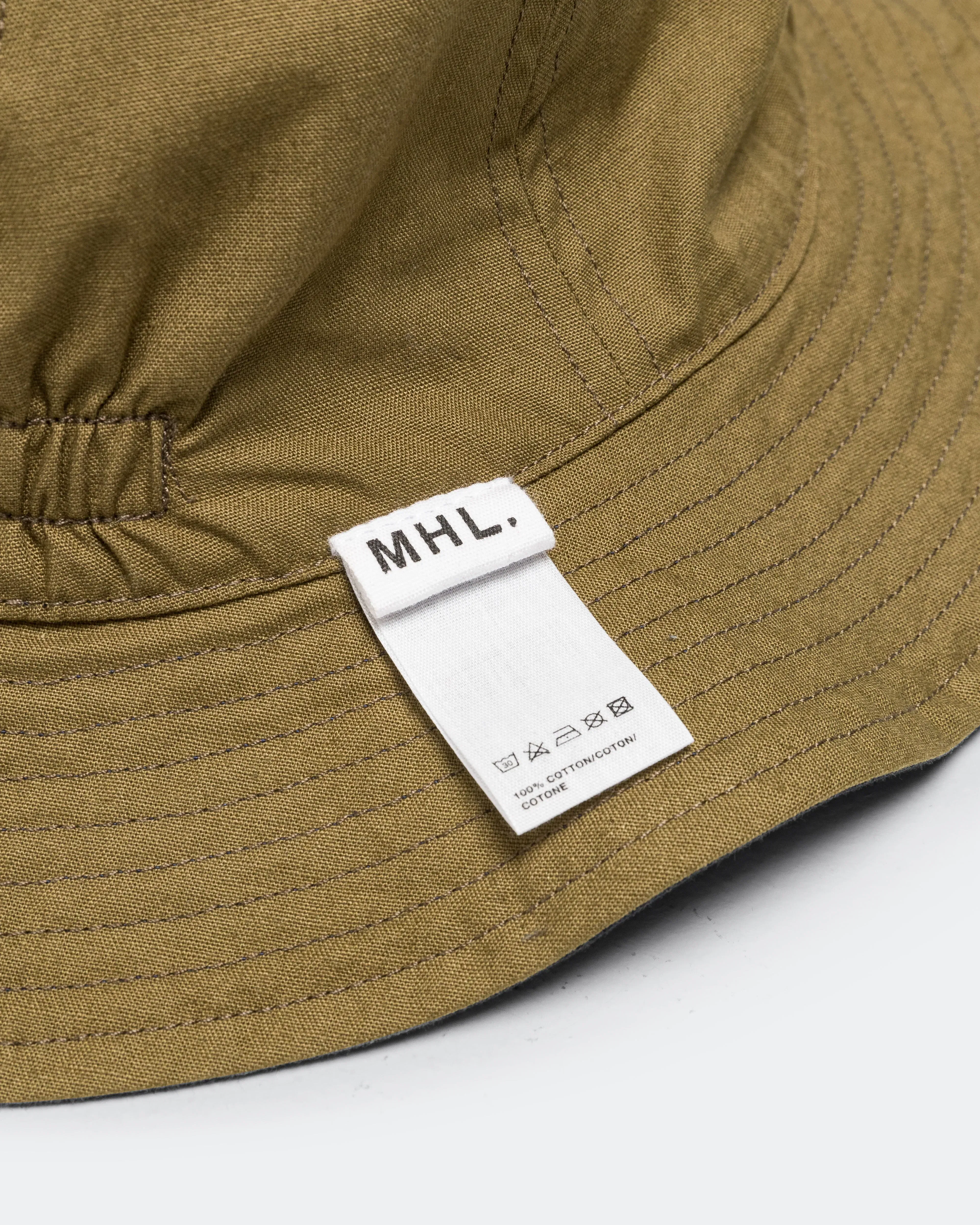 MHL. Reversible Bucket Hat - Ink/Olive Green Coarse Yarn