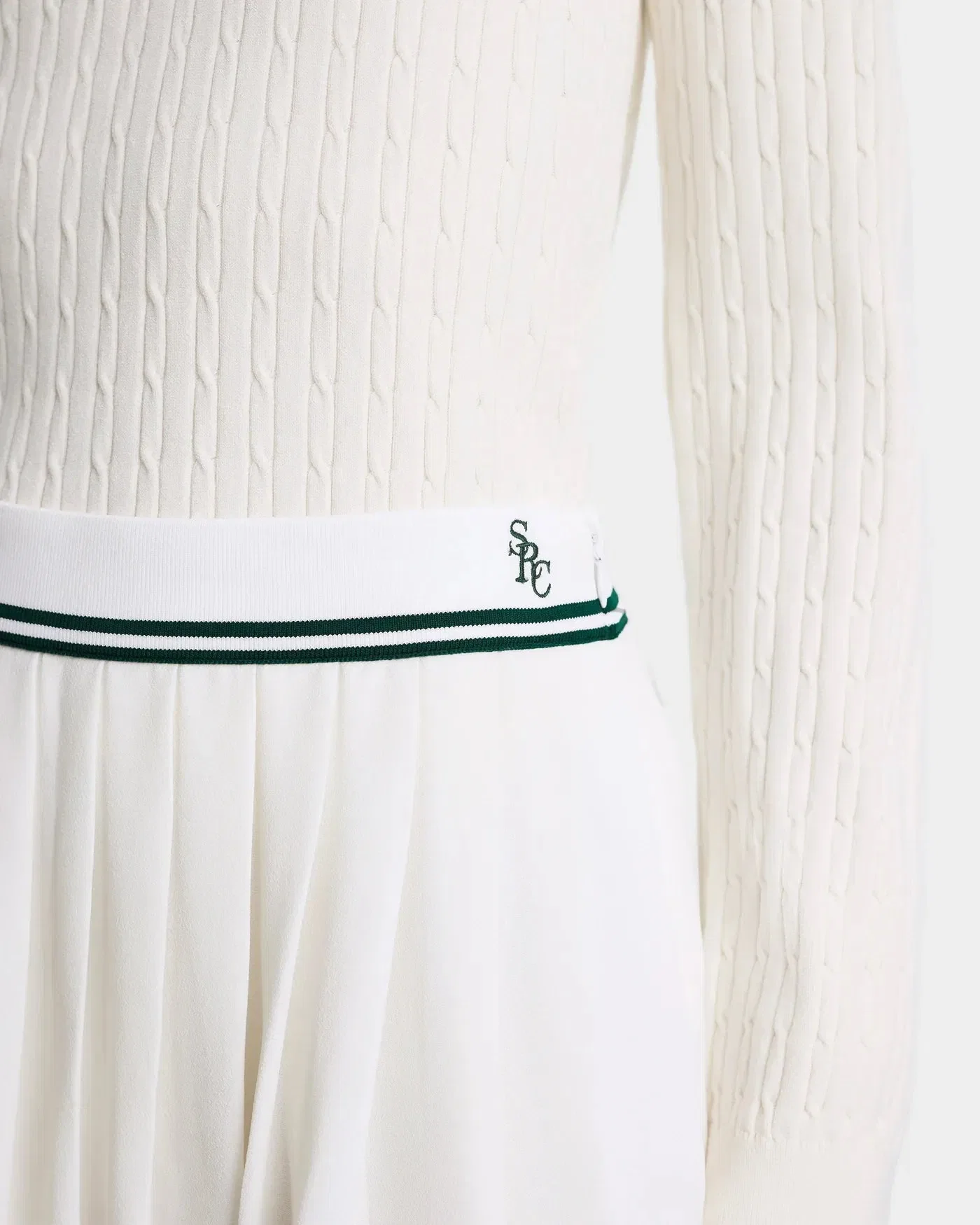 Sporty & Rich SRC Abigail Mini Skirt in Beige
