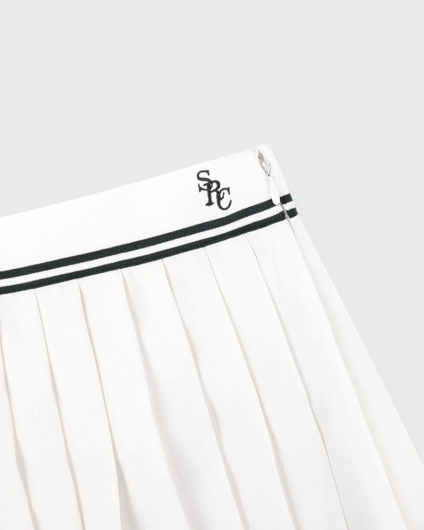 Sporty & Rich SRC Abigail Mini Skirt in Beige