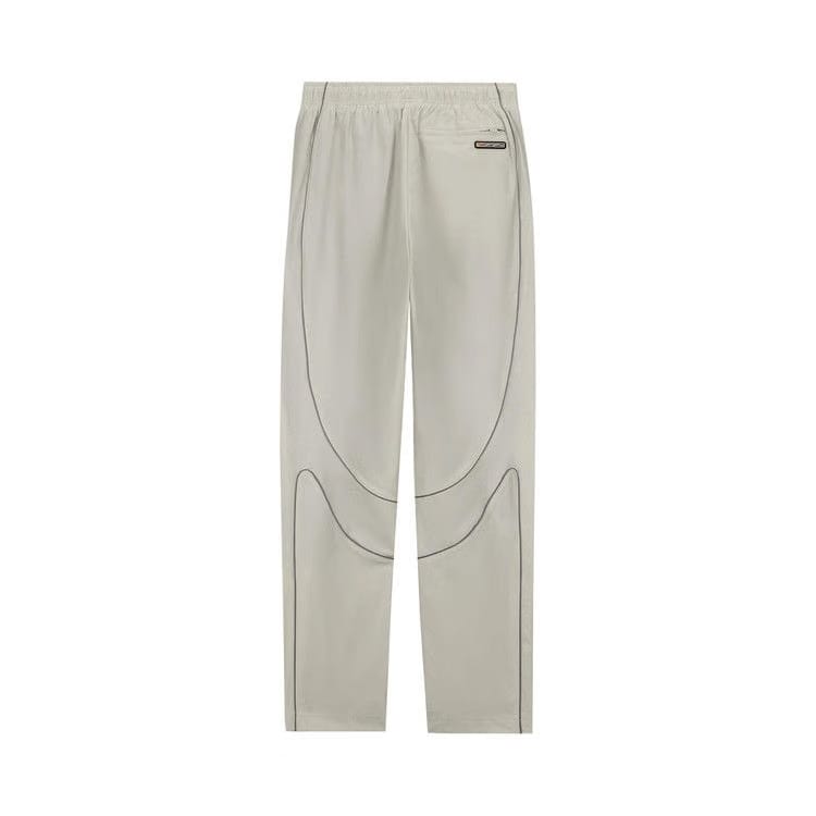 Corteiz x Nike Shell Trousers Off White
