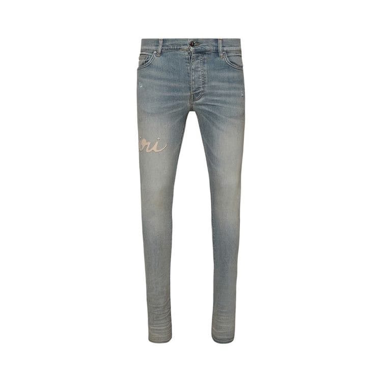 Amiri Script Logo Skinny Jean Antique Indigo