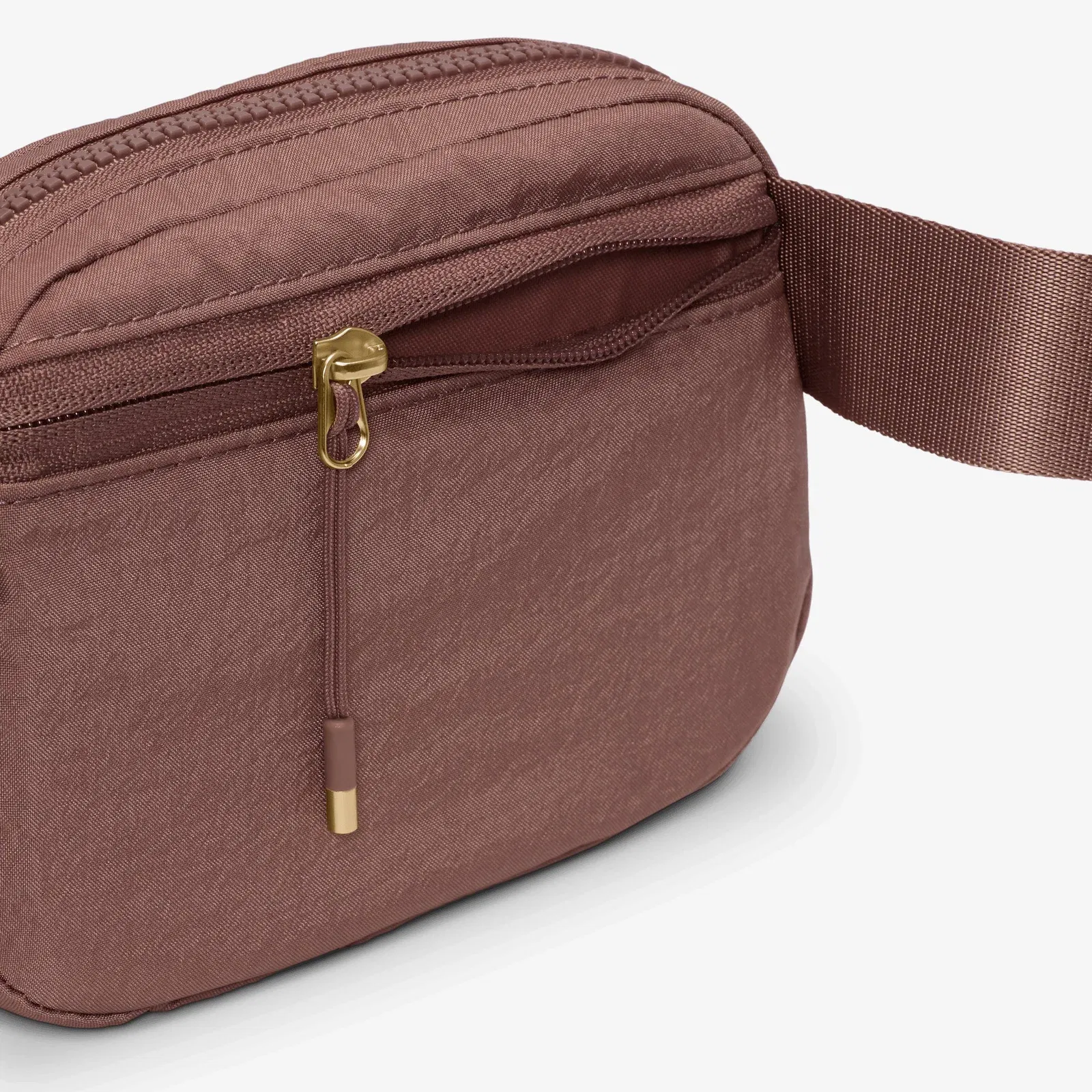 NIKE AURA CROSSBODY BAG (2L) { SMOKEY MAUVE/LT TRNSPRNT GLD