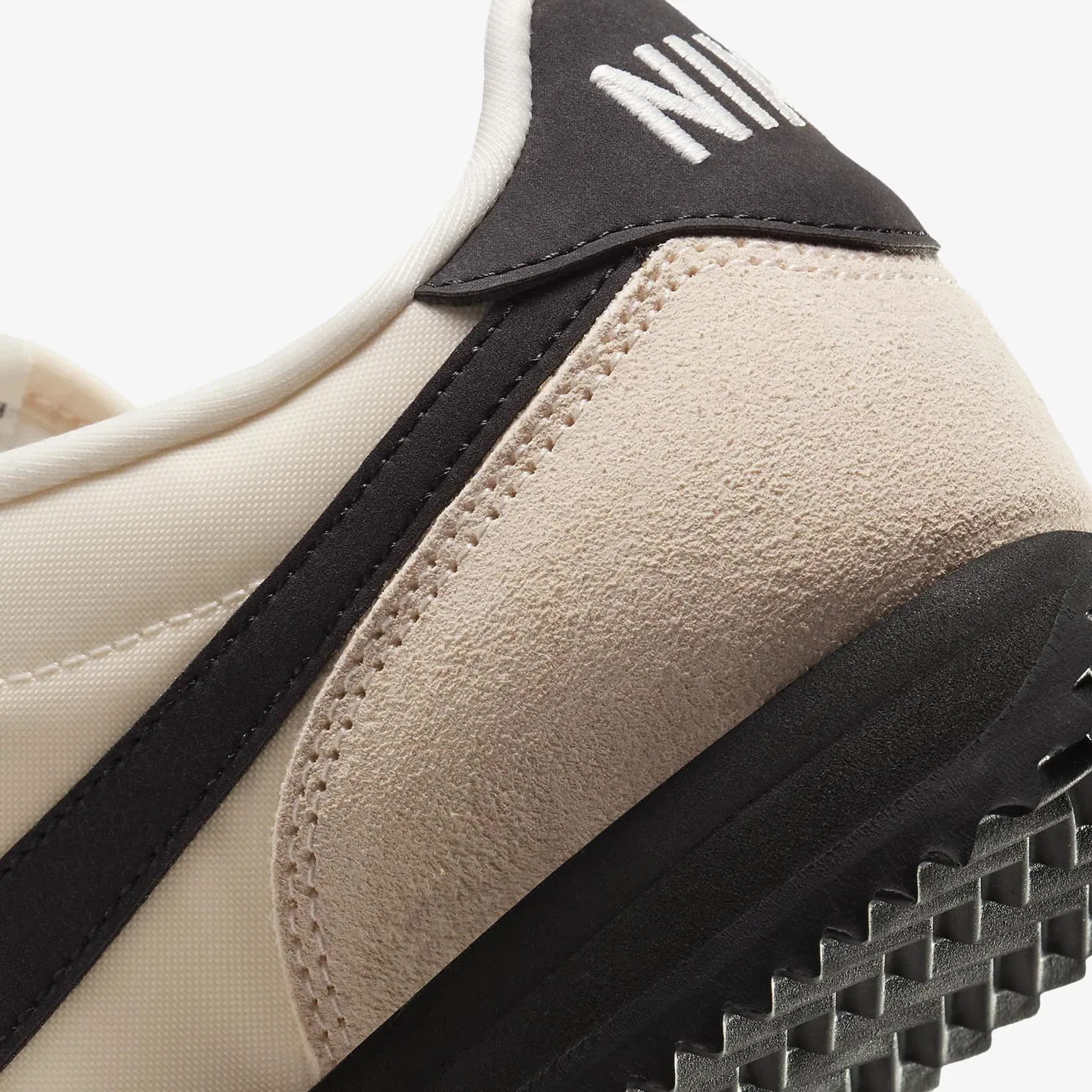 NIKE CORTEZ TEXTILE { GUAVA ICE/BLACK-SAIL-PHANTOM