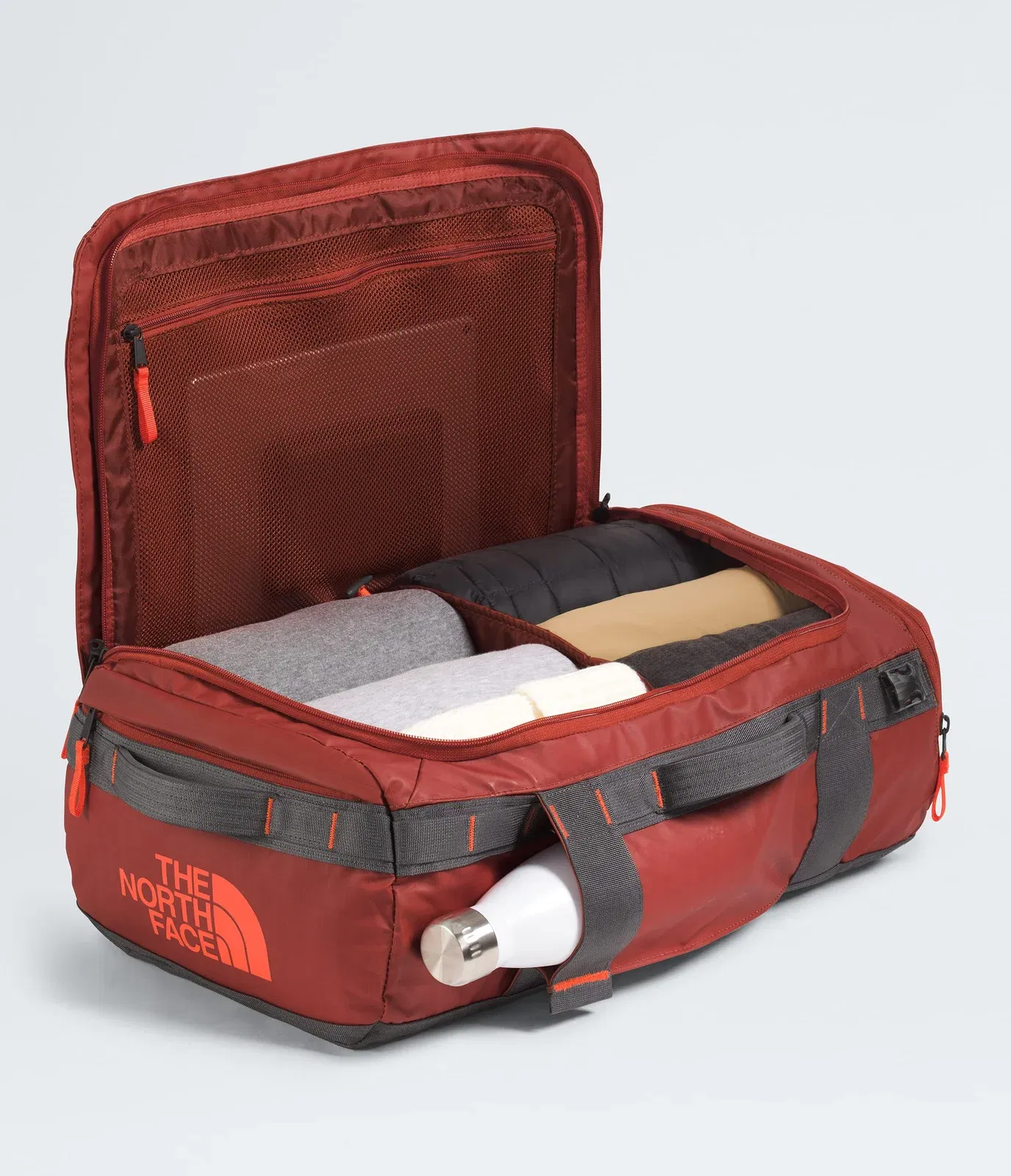 The North Face Base Camp™ Voyager Duffel—32L Iron Clay-Anthracite Grey-Lava Red