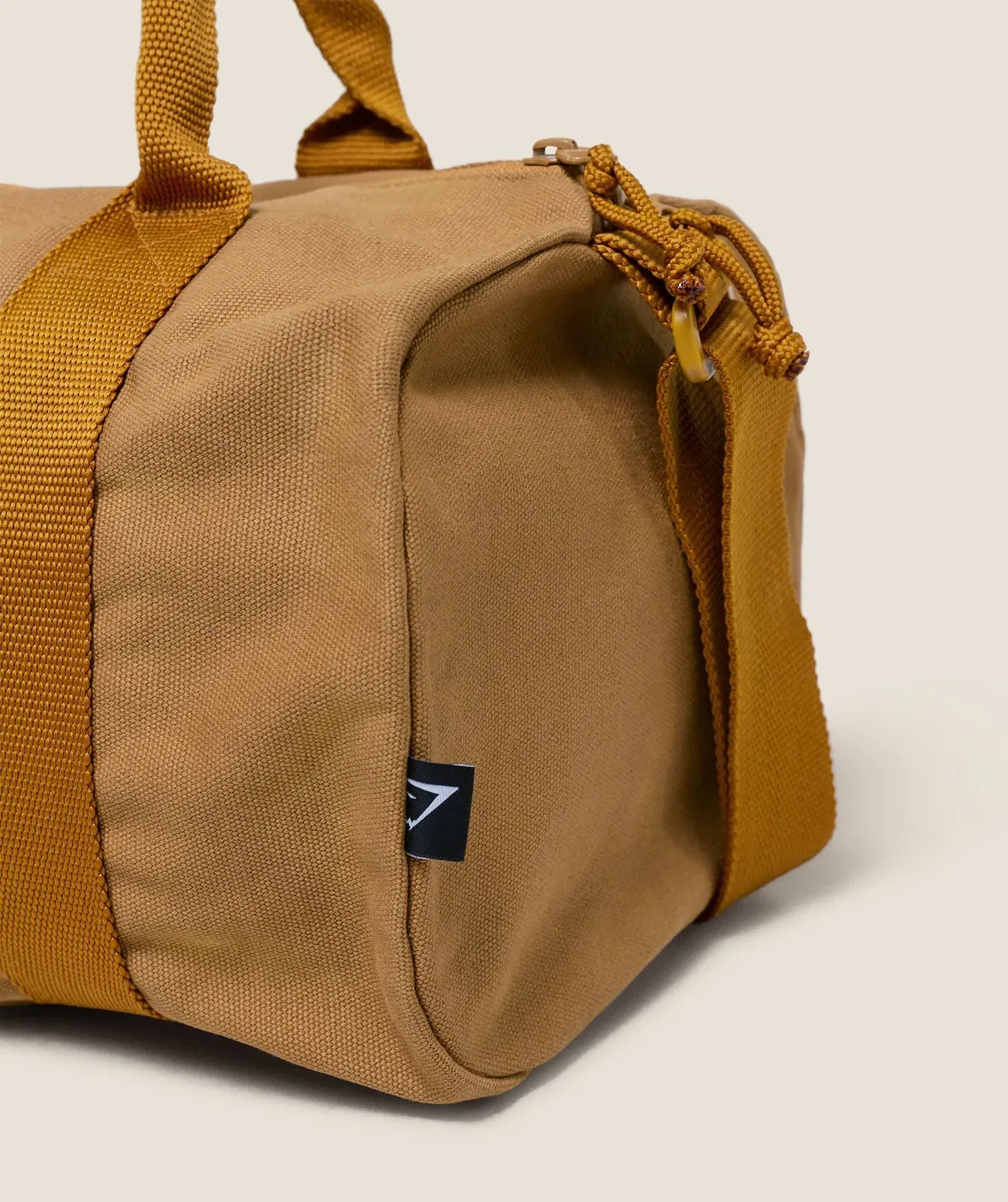 Women's Gymshark Strength Dept Mini Canvas Duffle Bag Antique Gold