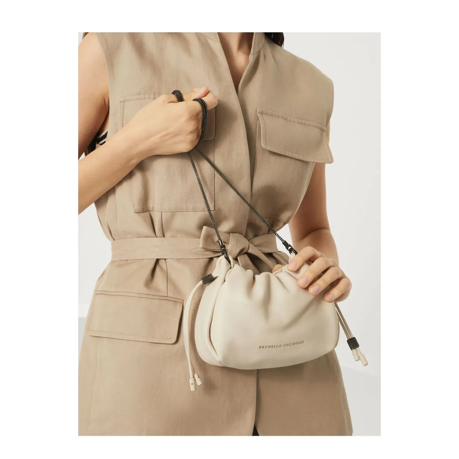 Mellow Beige Crossbody Bag with Drawstring Closure and Chain Shoulder Strap