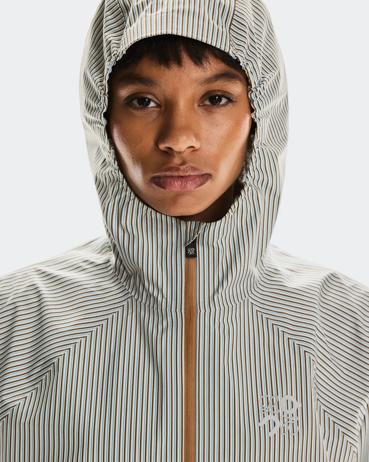 On Storm Anorak Loewe Beige Blue