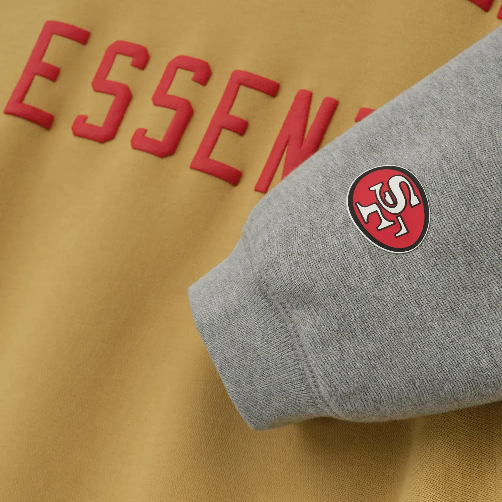 Fear Of God Essentials Forty Niners Sport Hoodie Prairie Sand Concrete Heather